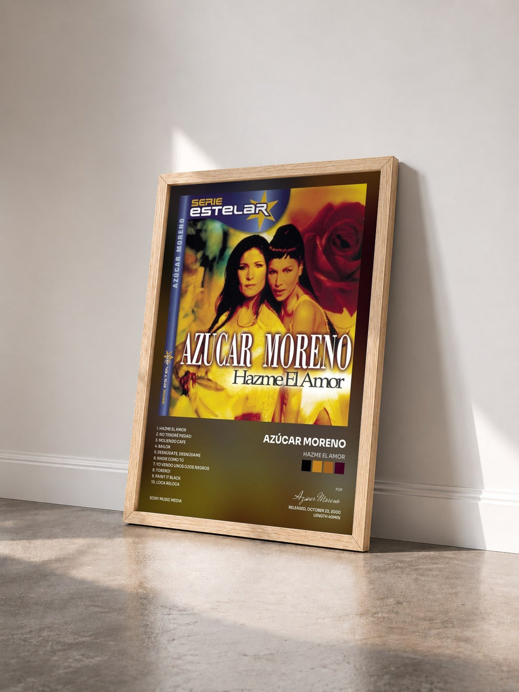 #bois Tableau de l'album Hazme El Amor de Azúcar Moreno vu de trois quarts, cadre en bois brut
