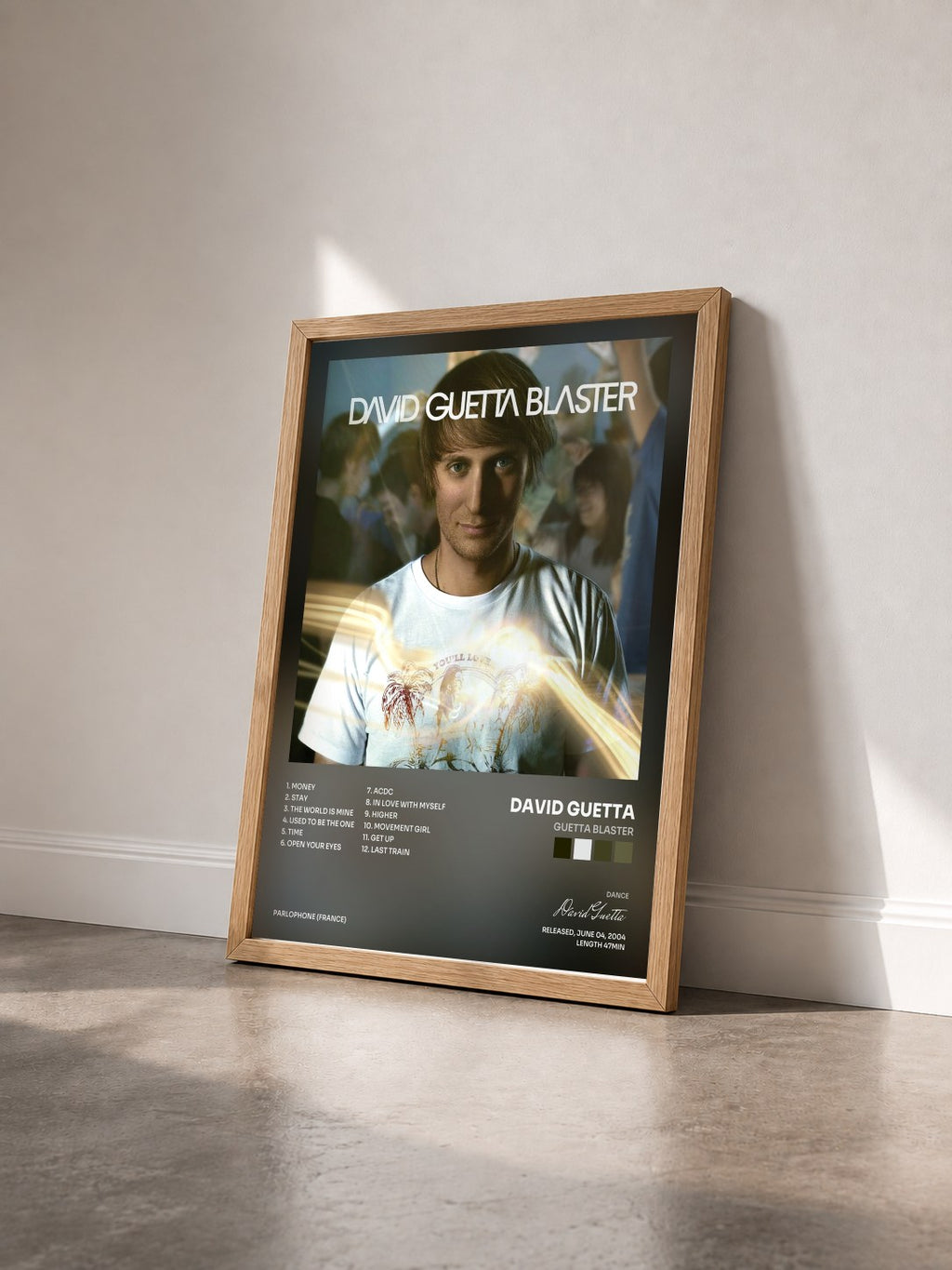 #bois Tableau de l'album Guetta Blaster de David Guetta vu de trois quarts, cadre en bois brut