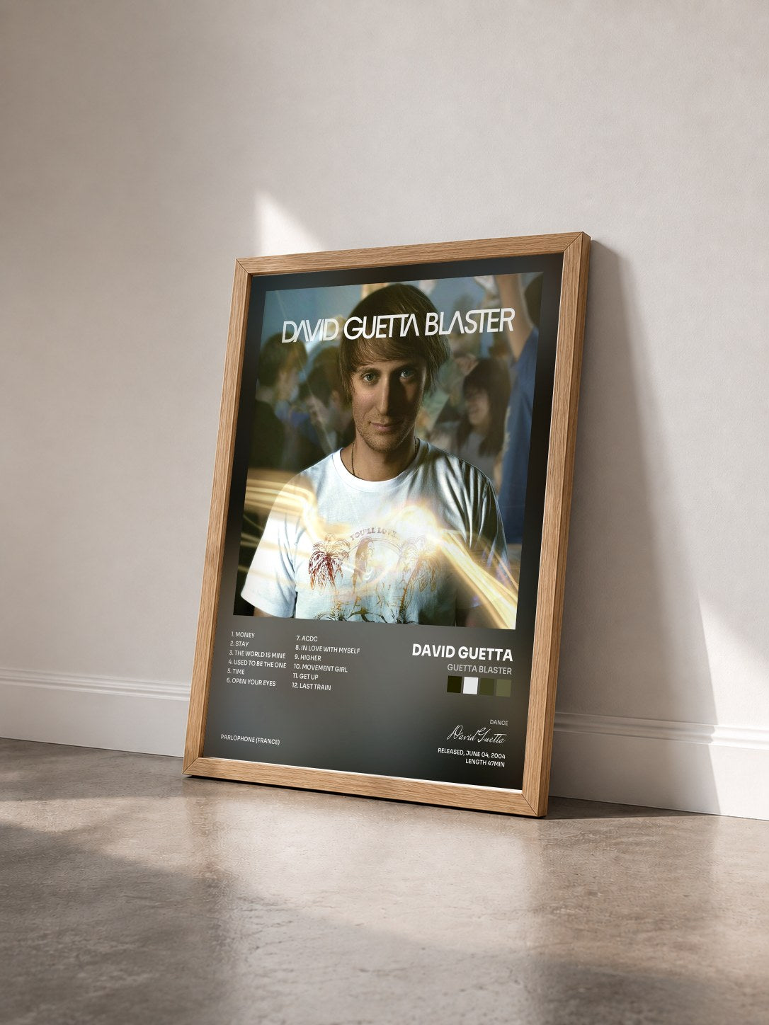 #bois Tableau de l'album Guetta Blaster de David Guetta vu de trois quarts, cadre en bois brut