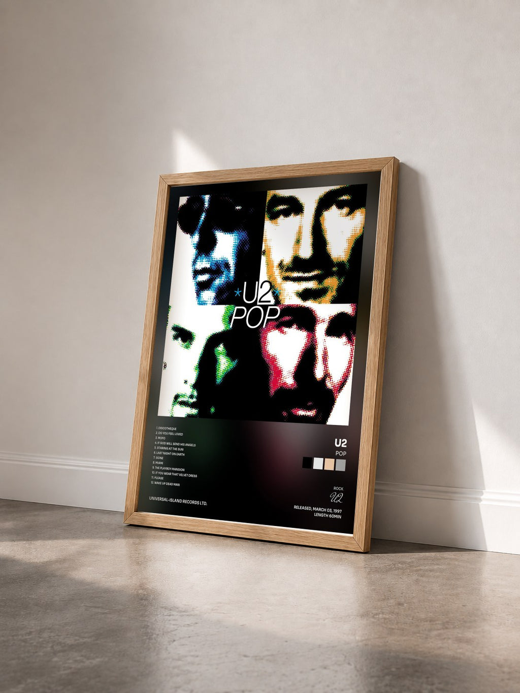 #bois Tableau de l'album Pop de U2 vu de trois quarts, cadre en bois brut
