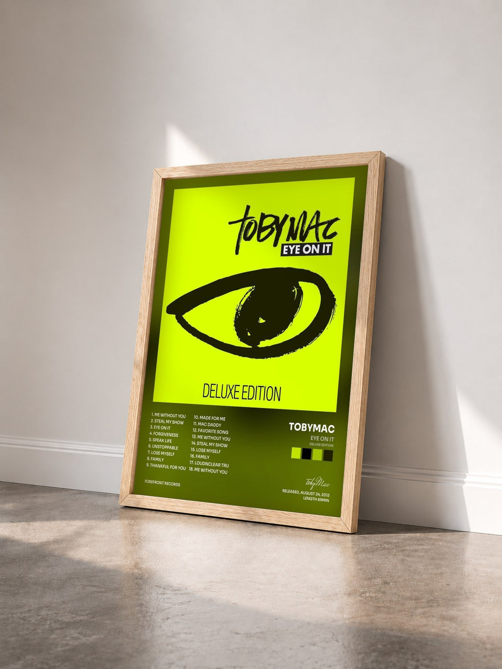 #bois Tableau de l'album Eye On It (Deluxe Edition) de tobyMac vu de trois quarts, cadre en bois brut