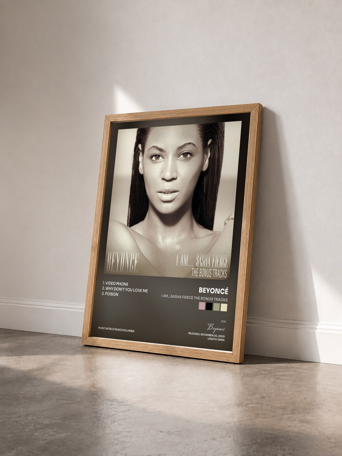 #bois Tableau de l'album I AM...SASHA FIERCE THE BONUS TRACKS de Beyoncé vu de trois quarts, cadre en bois brut