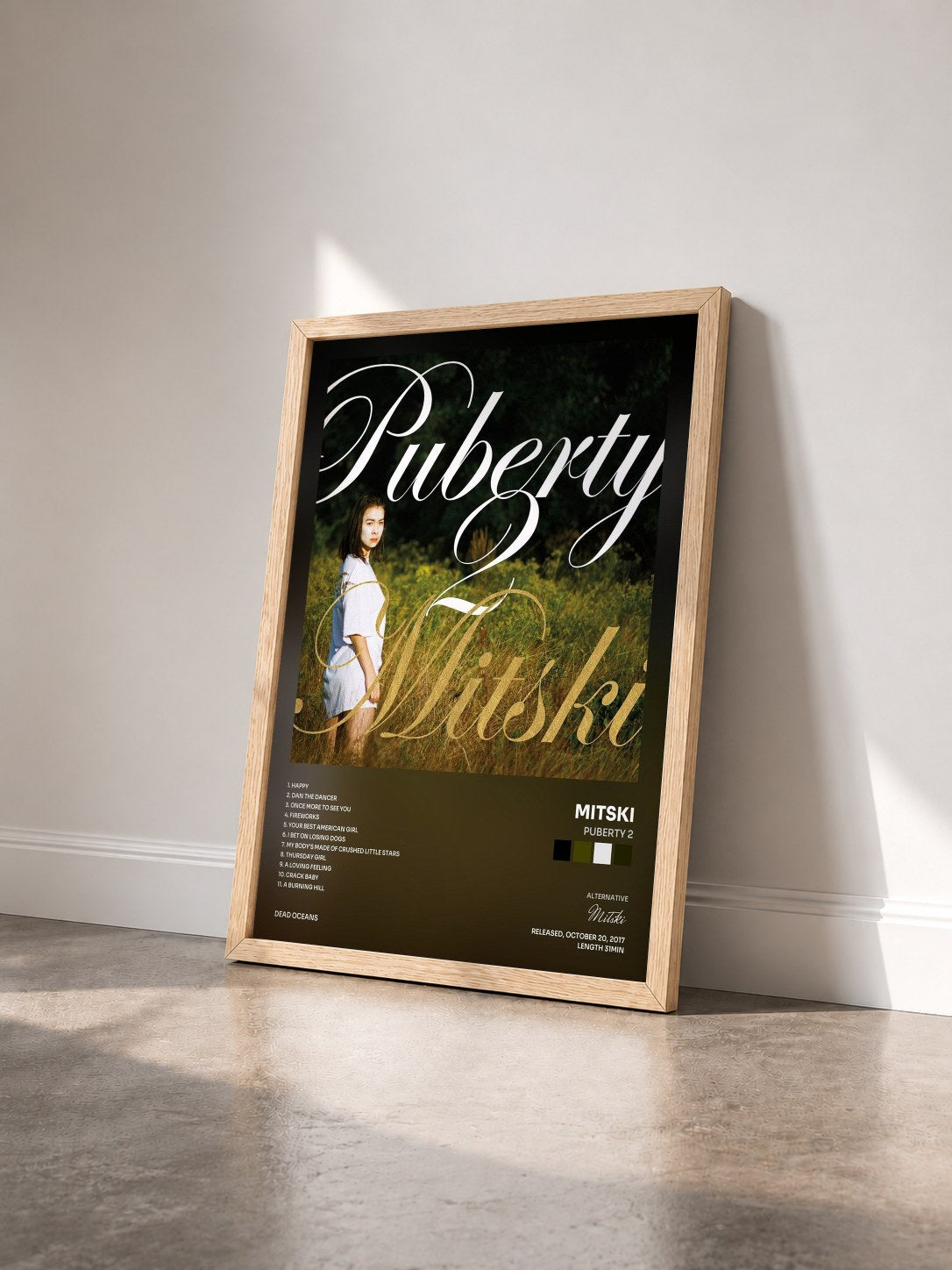 #bois Tableau de l'album Puberty 2 de Mitski vu de trois quarts, cadre en bois brut