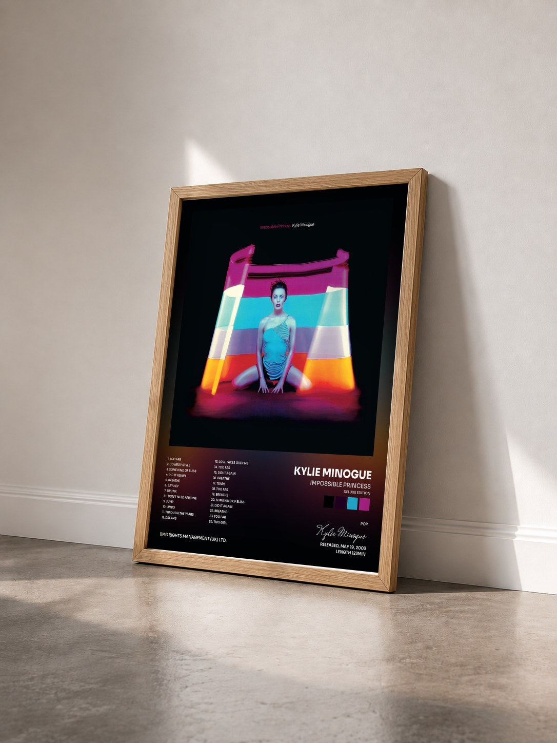 #bois Tableau de l'album Impossible Princess (Deluxe Edition) de Kylie Minogue vu de trois quarts, cadre en bois brut