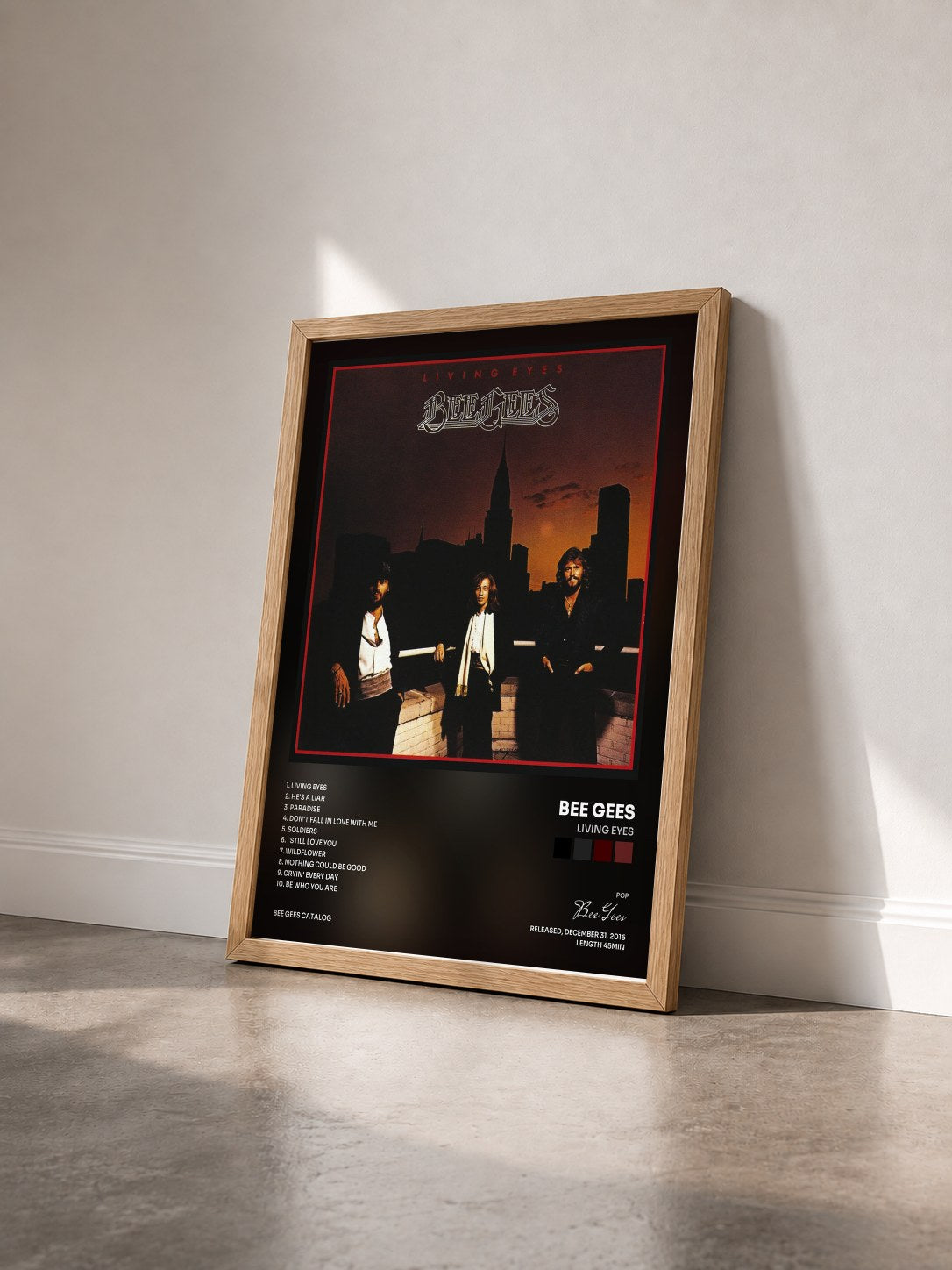 #bois Tableau de l'album Living Eyes de Bee Gees vu de trois quarts, cadre en bois brut