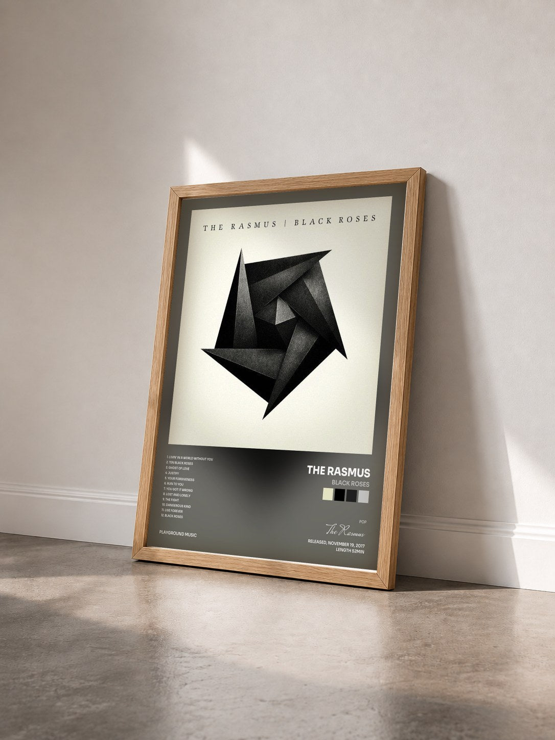 #bois Tableau de l'album Black Roses de The Rasmus vu de trois quarts, cadre en bois brut