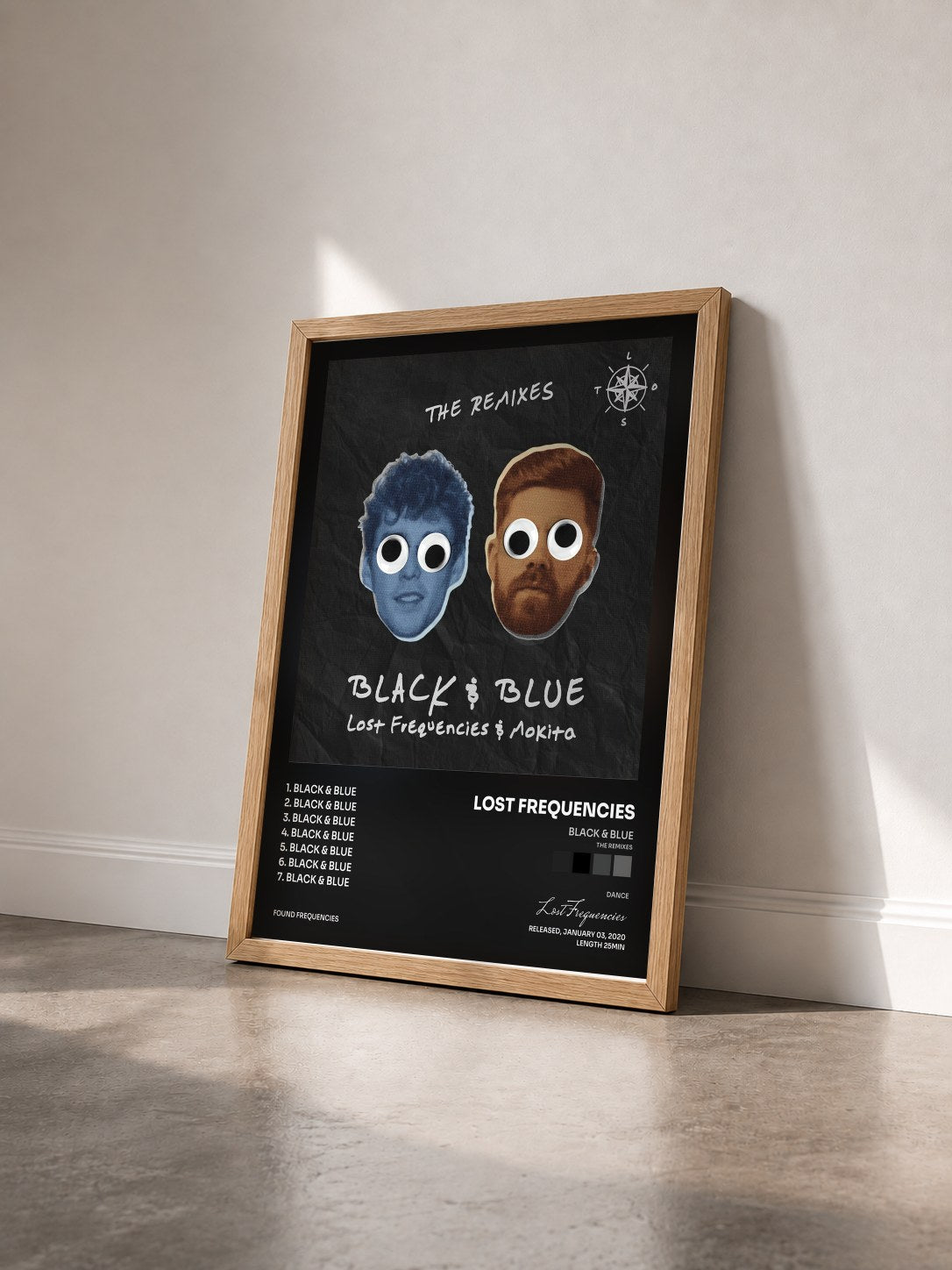 #bois Tableau de l'album Black & Blue (The Remixes) de Lost Frequencies vu de trois quarts, cadre en bois brut