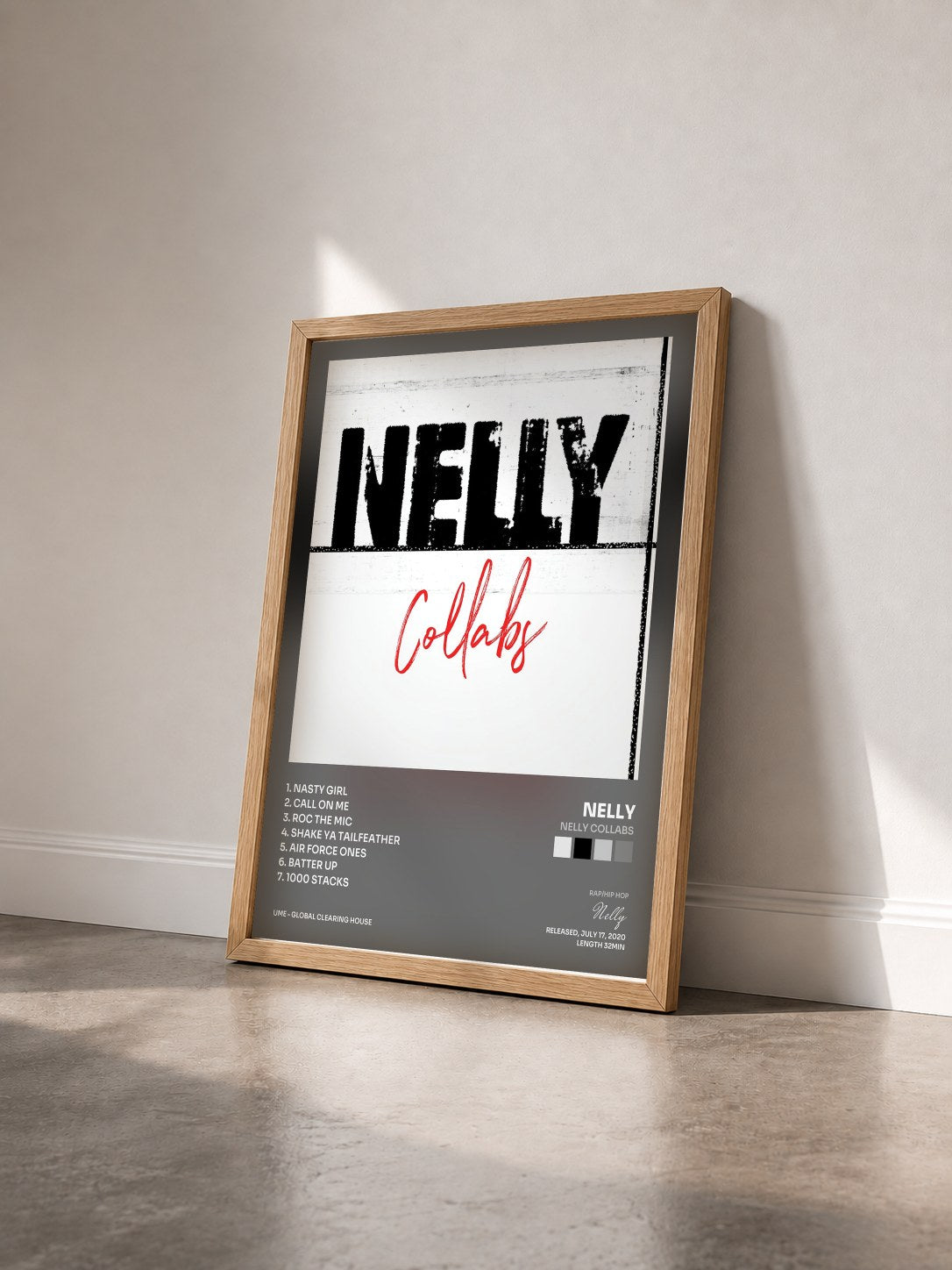 #bois Tableau de l'album Nelly Collabs de Nelly vu de trois quarts, cadre en bois brut