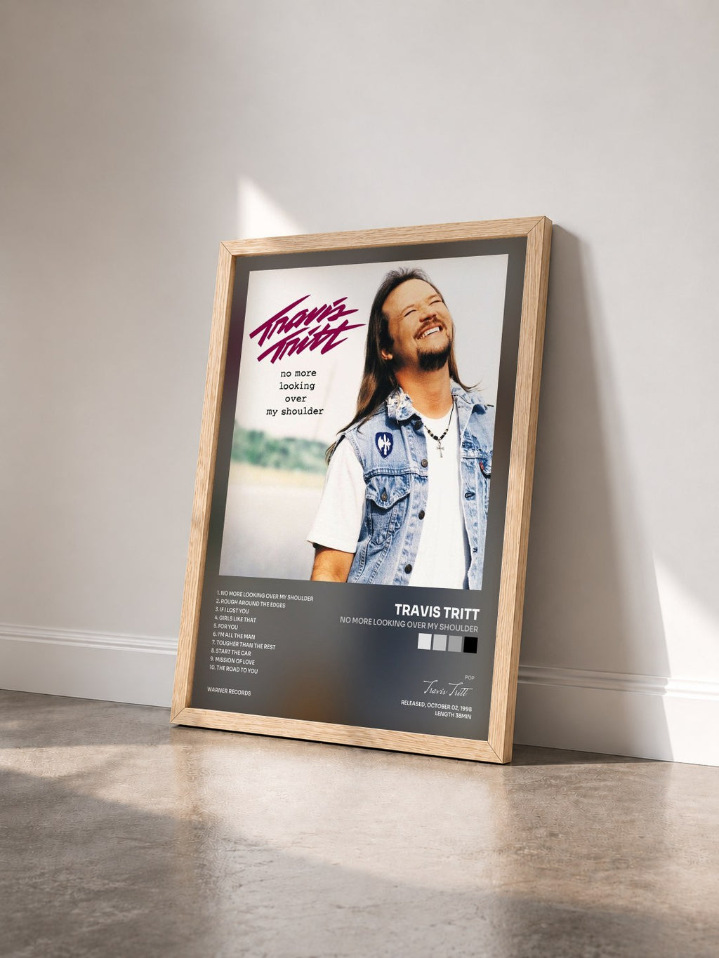 #bois Tableau de l'album No More Looking Over My Shoulder de Travis Tritt vu de trois quarts, cadre en bois brut