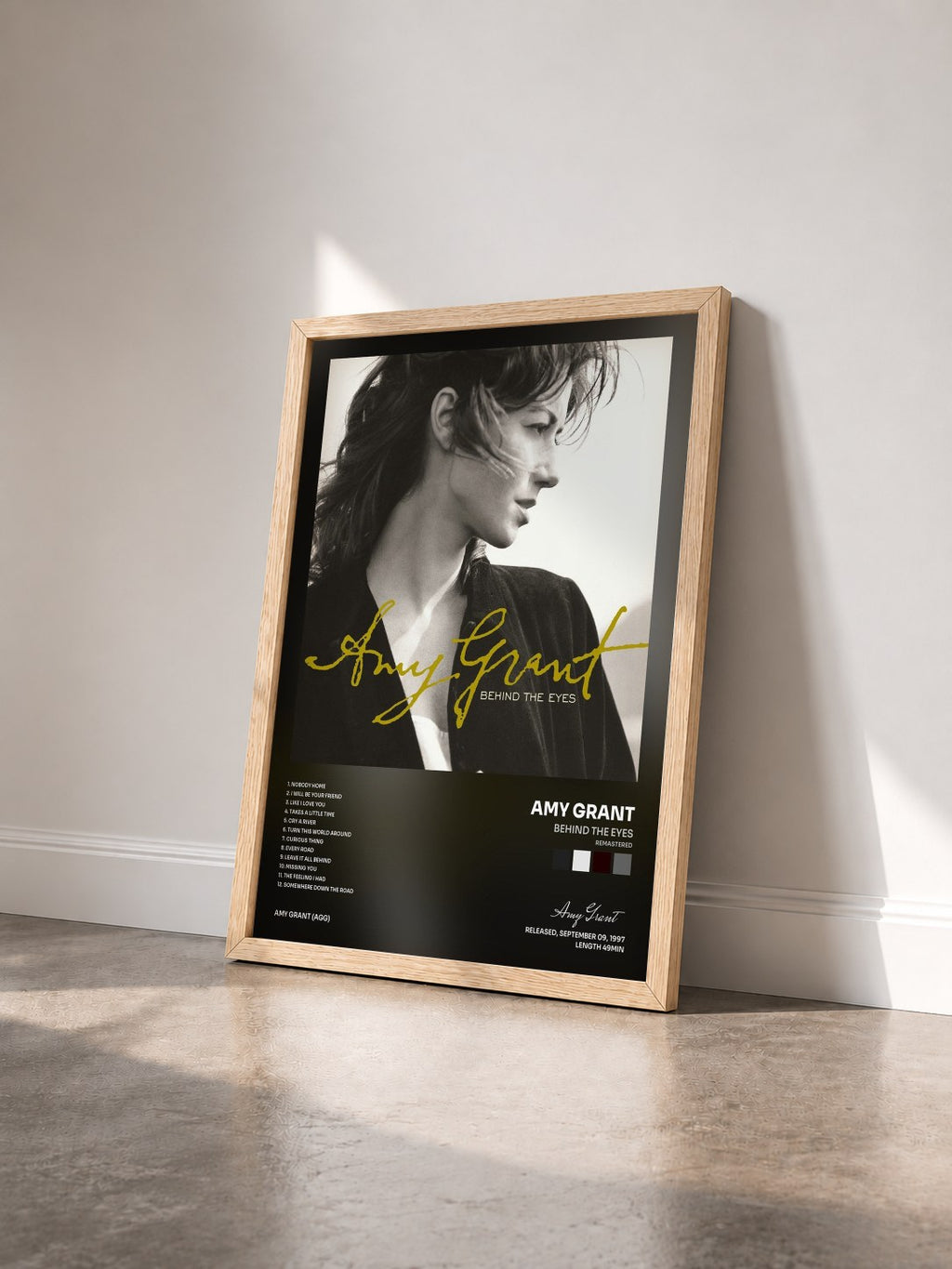 #bois Tableau de l'album Behind The Eyes (Remastered) de Amy Grant vu de trois quarts, cadre en bois brut