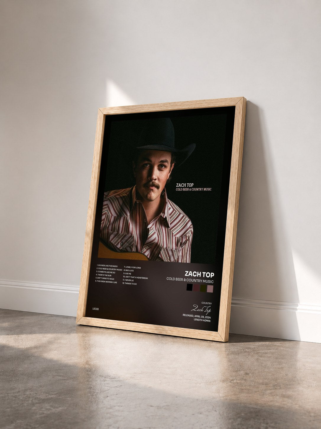 #bois Tableau de l'album Cold Beer & Country Music de Zach Top vu de trois quarts, cadre en bois brut