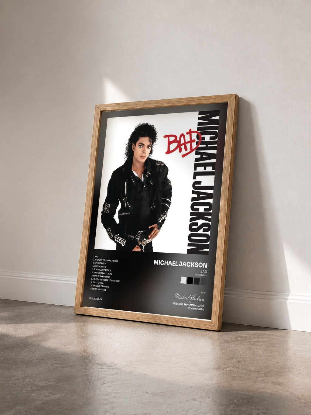 #bois Tableau de l'album Bad (Remastered) de Michael Jackson vu de trois quarts, cadre en bois brut
