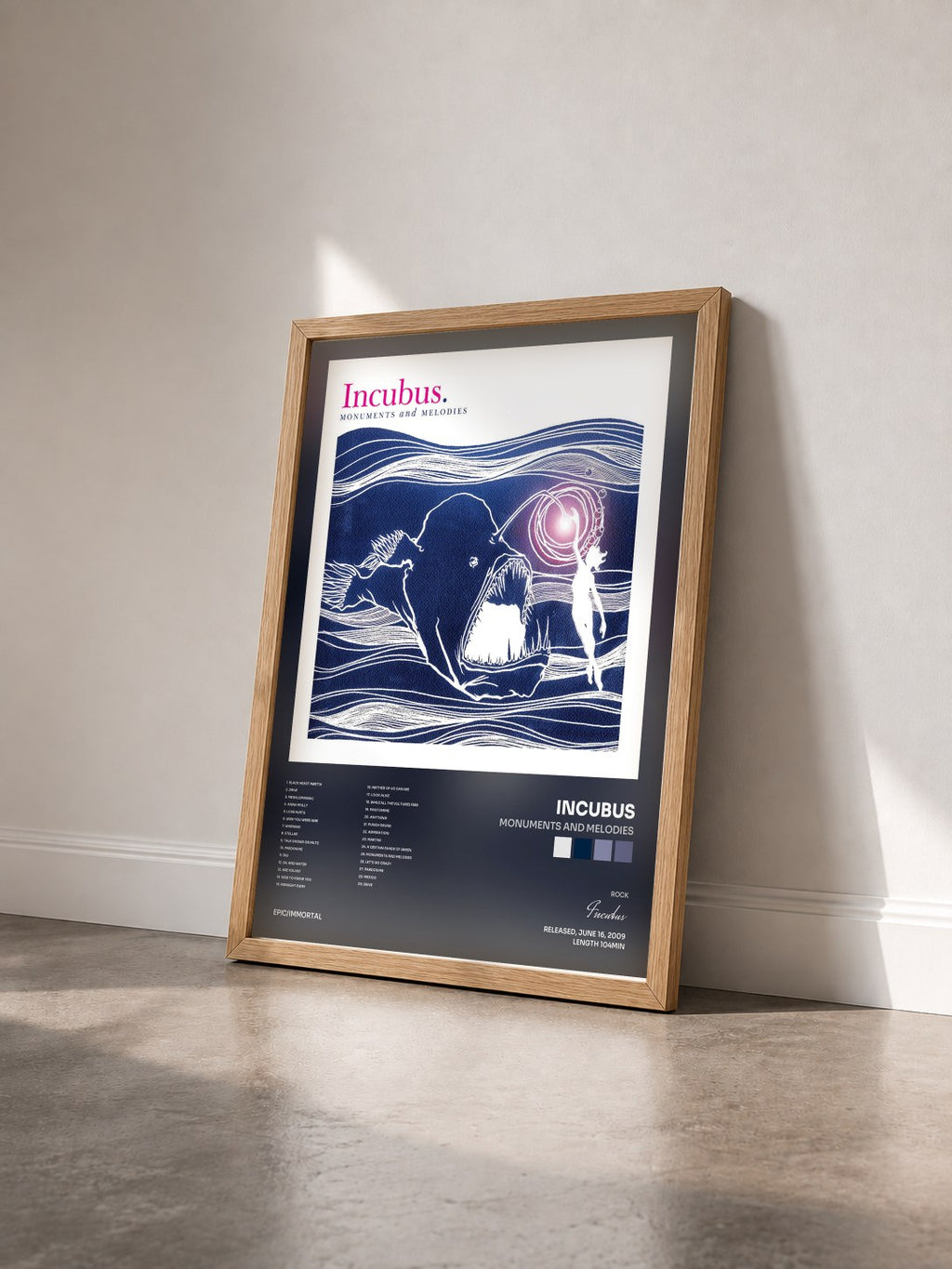 #bois Tableau de l'album Monuments And Melodies de Incubus vu de trois quarts, cadre en bois brut