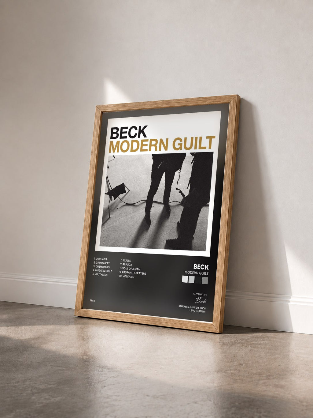 #bois Tableau de l'album Modern Guilt de Beck vu de trois quarts, cadre en bois brut