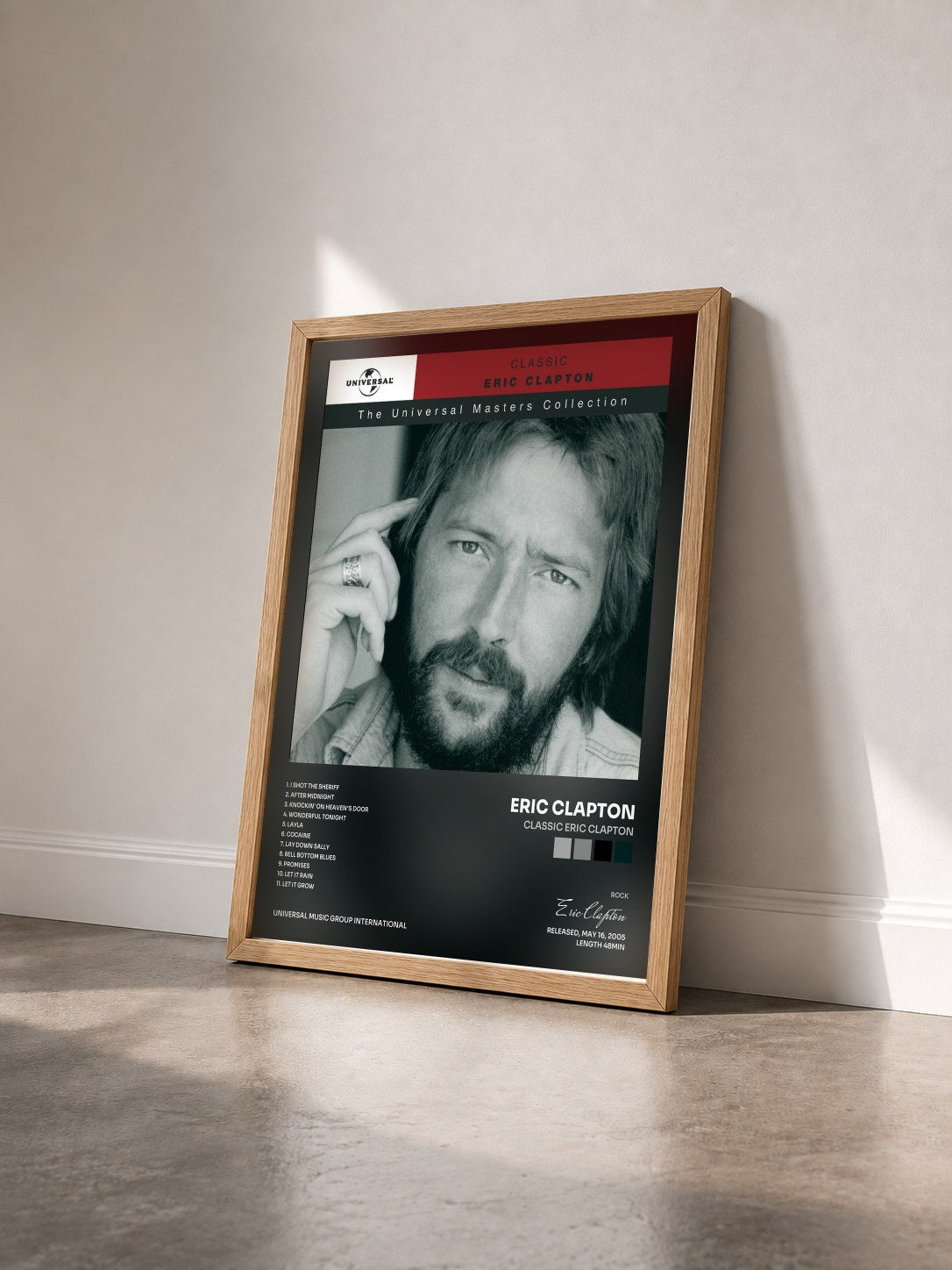 #bois Tableau de l'album Classic Eric Clapton de Eric Clapton vu de trois quarts, cadre en bois brut