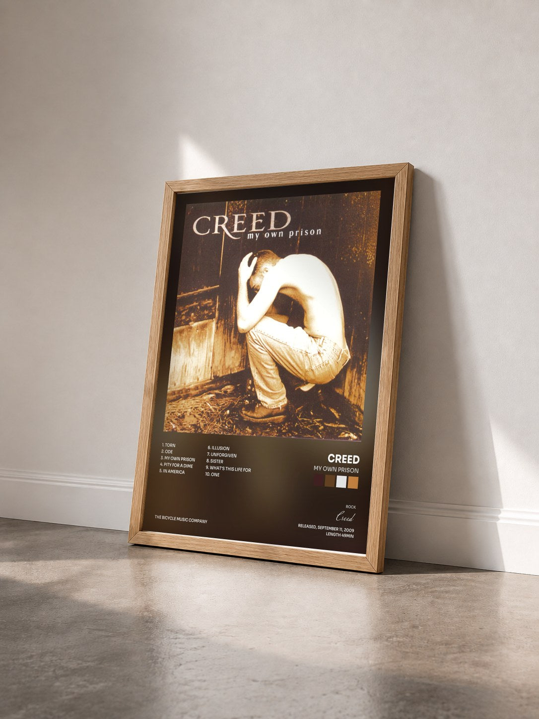 #bois Tableau de l'album My Own Prison de Creed vu de trois quarts, cadre en bois brut