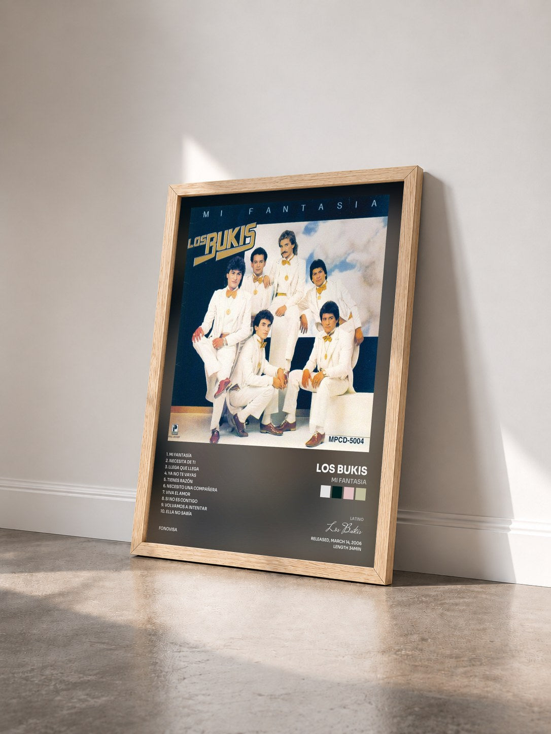 #bois Tableau de l'album Mi Fantasia de Los Bukis vu de trois quarts, cadre en bois brut