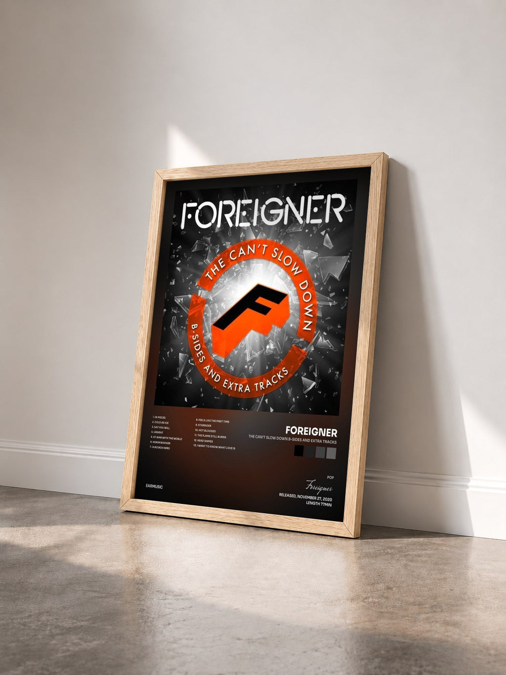 #bois Tableau de l'album The Can't Slow Down B-Sides and Extra Tracks de Foreigner vu de trois quarts, cadre en bois brut