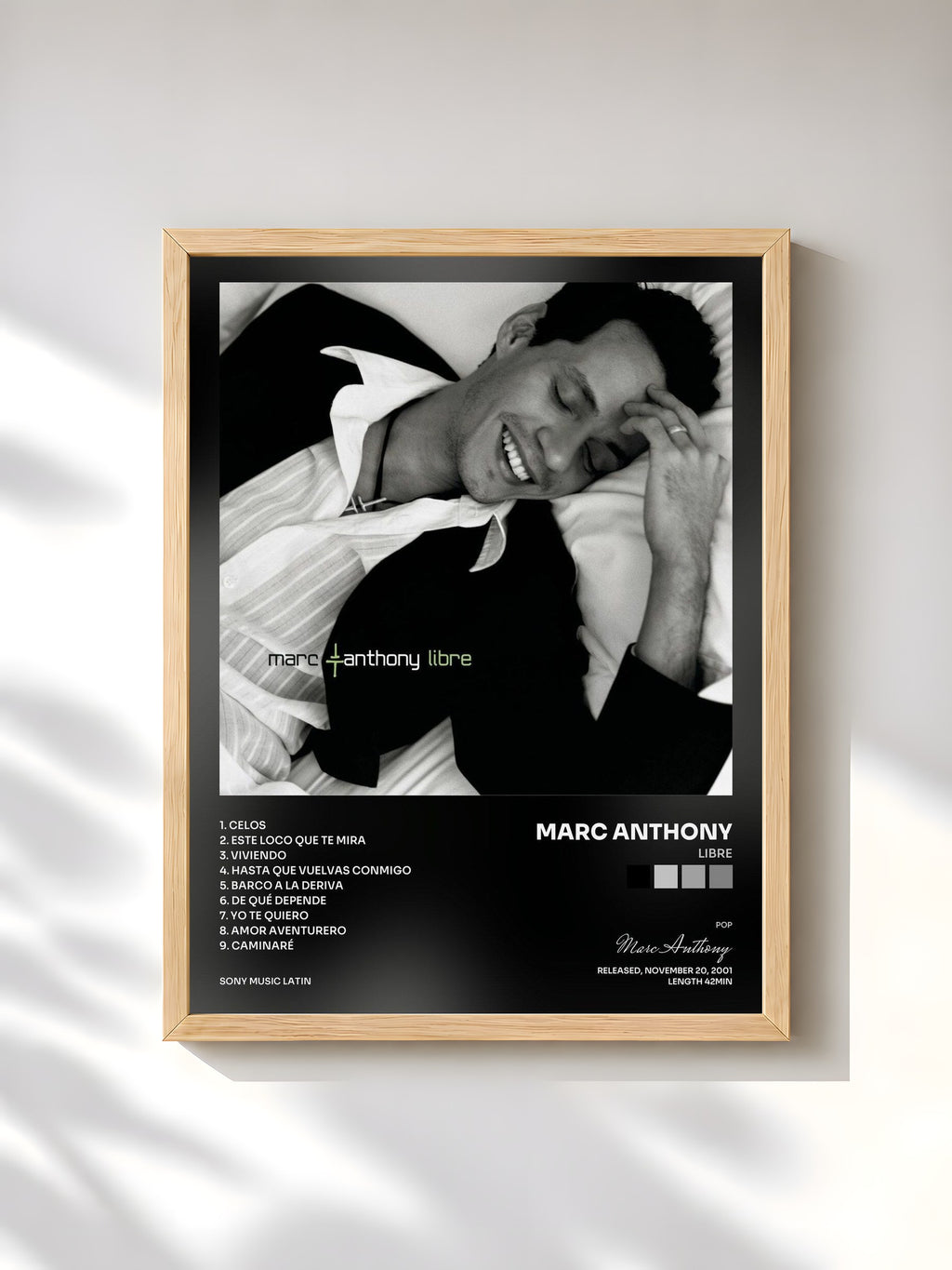 #bois Tableau de l'album Libre de Marc Anthony, cadre en bois brut, imprimé et encadré en France