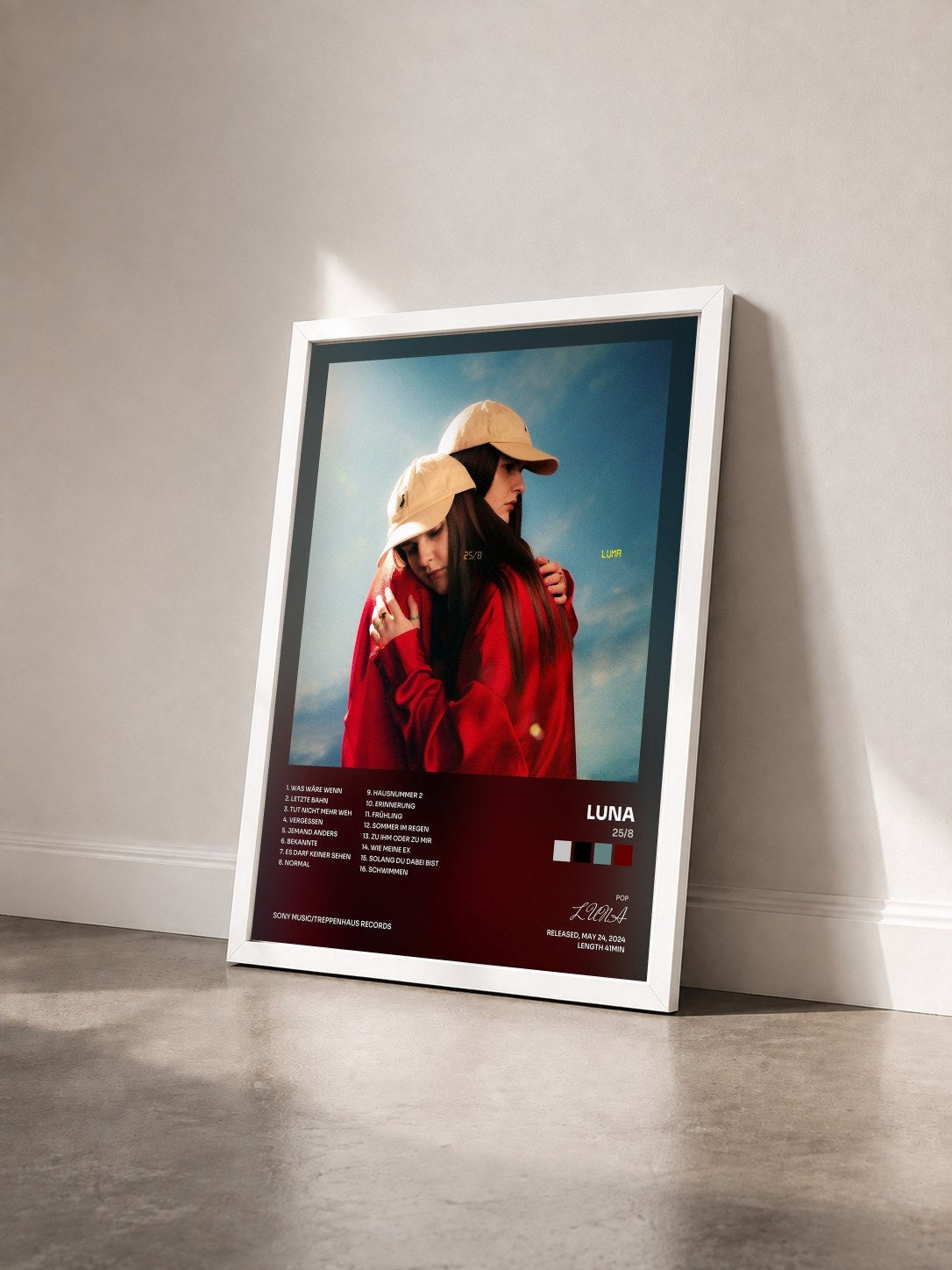 #blanc Tableau de l'album 25/8 de LUNA vu de trois quarts, cadre blanc