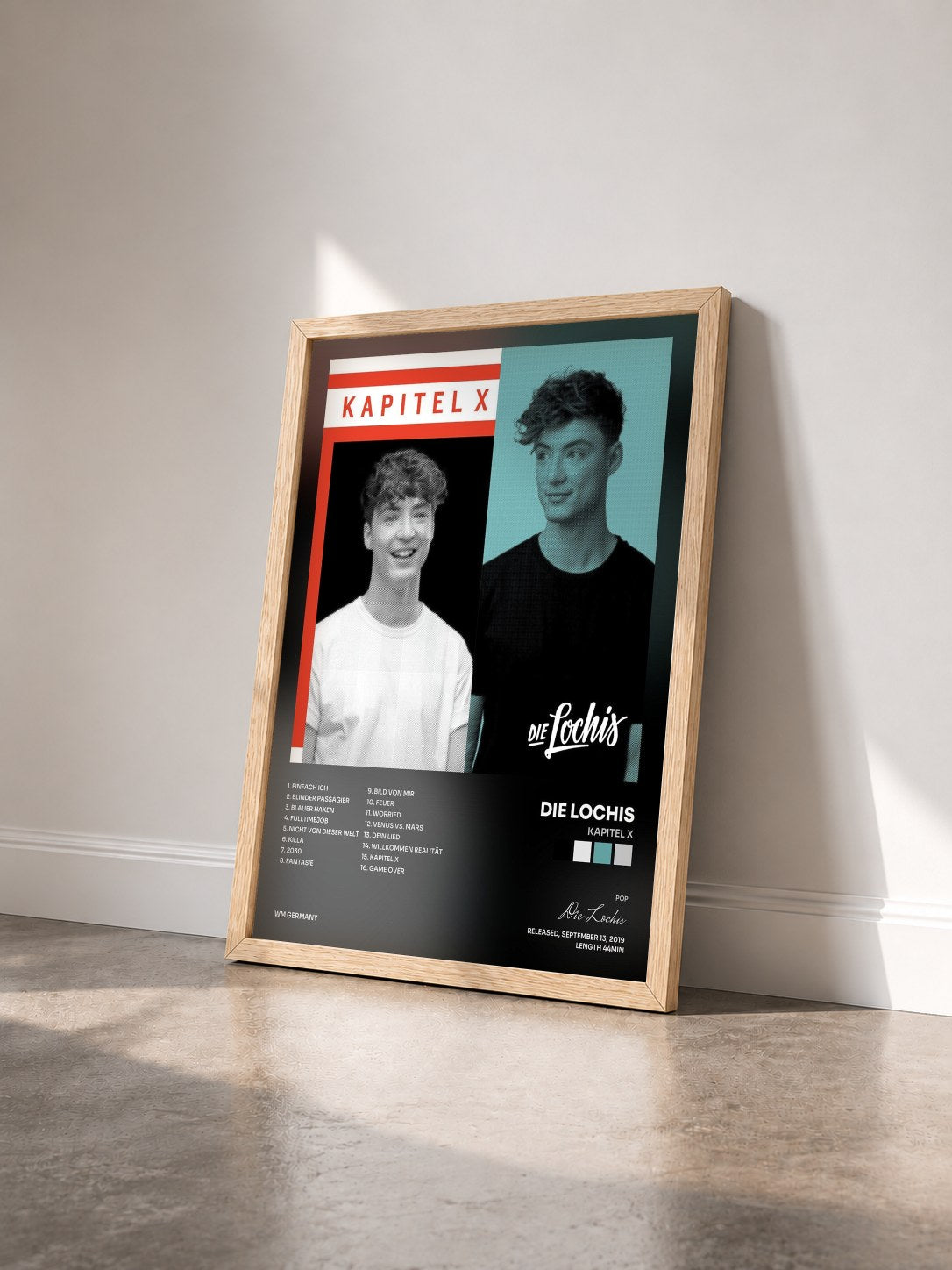 #bois Tableau de l'album Kapitel X de Die Lochis vu de trois quarts, cadre en bois brut