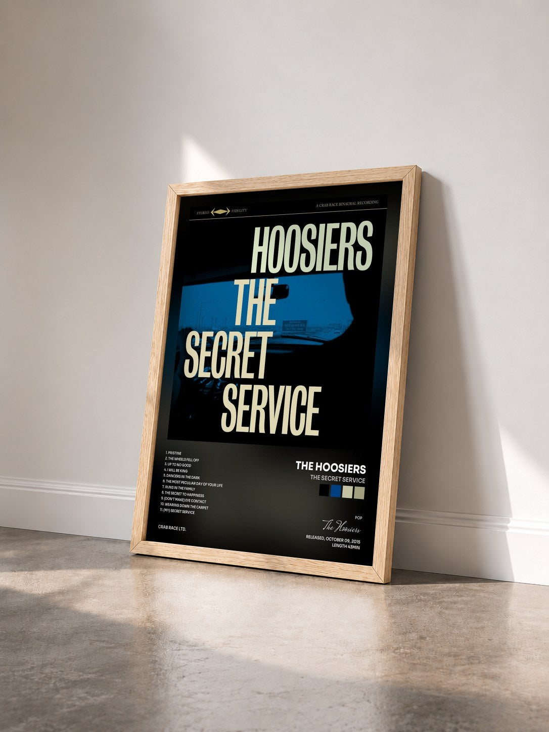 #bois Tableau de l'album The Secret Service de The Hoosiers vu de trois quarts, cadre en bois brut