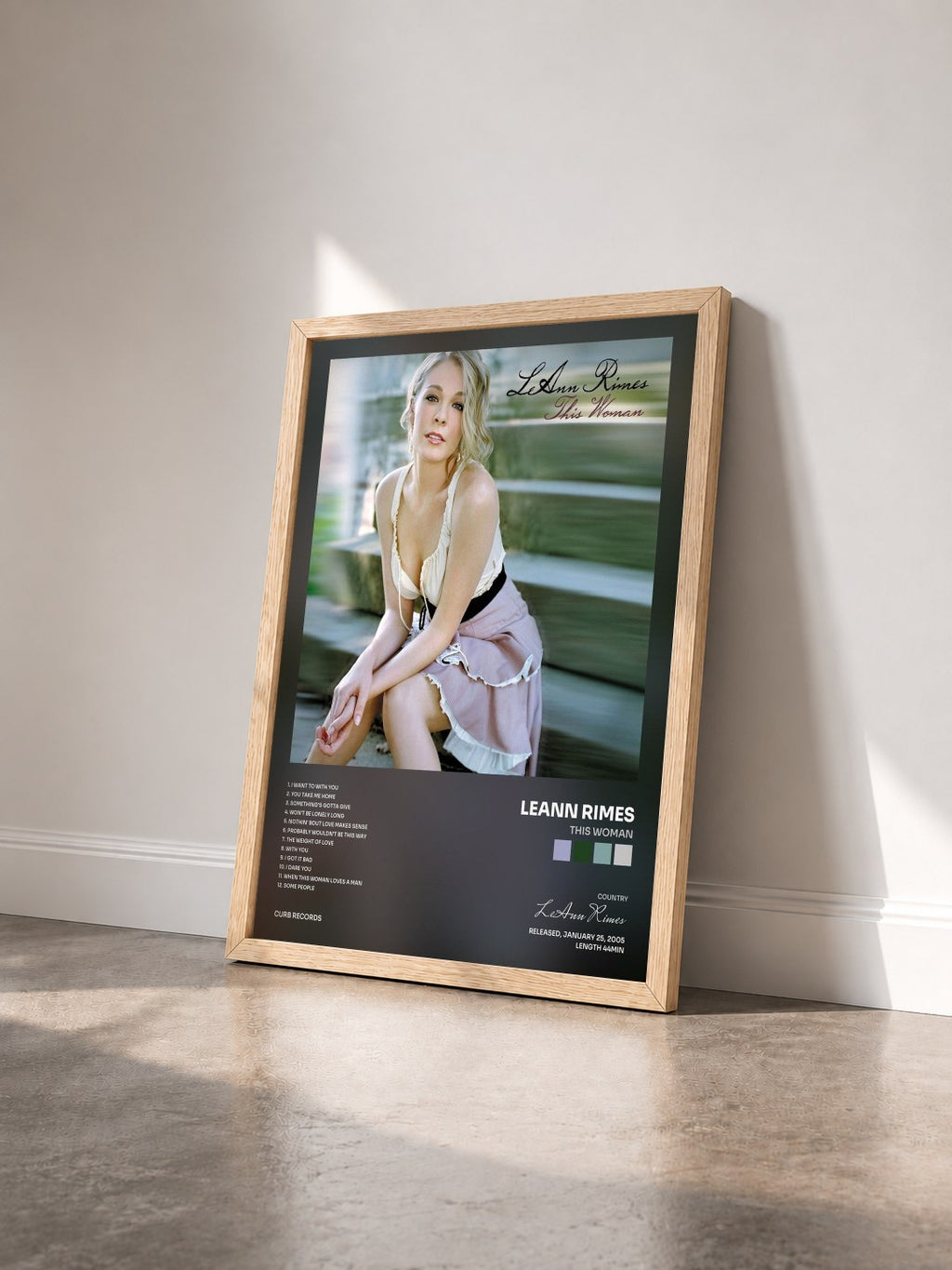 #bois Tableau de l'album This Woman de LeAnn Rimes vu de trois quarts, cadre en bois brut