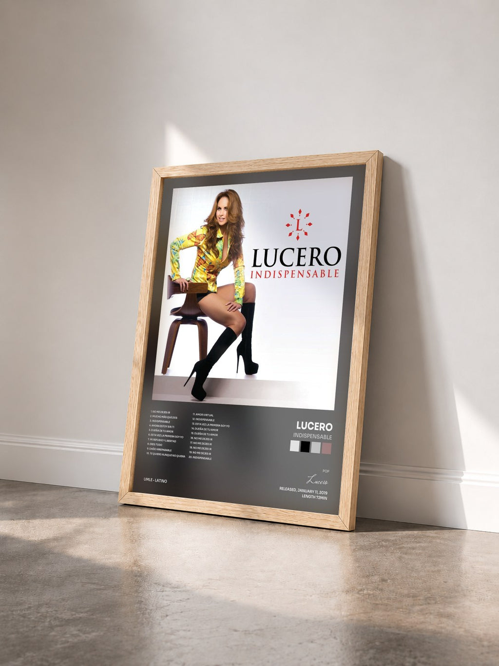#bois Tableau de l'album Indispensable de Lucero vu de trois quarts, cadre en bois brut