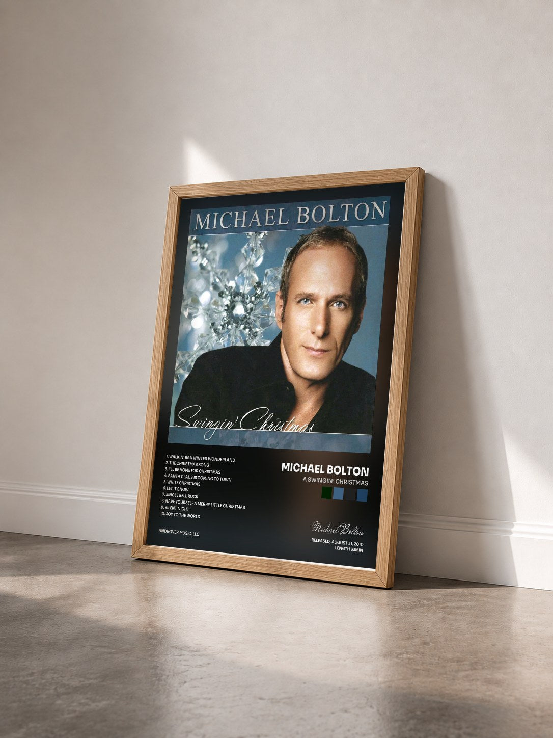 #bois Tableau de l'album A Swingin' Christmas de Michael Bolton vu de trois quarts, cadre en bois brut