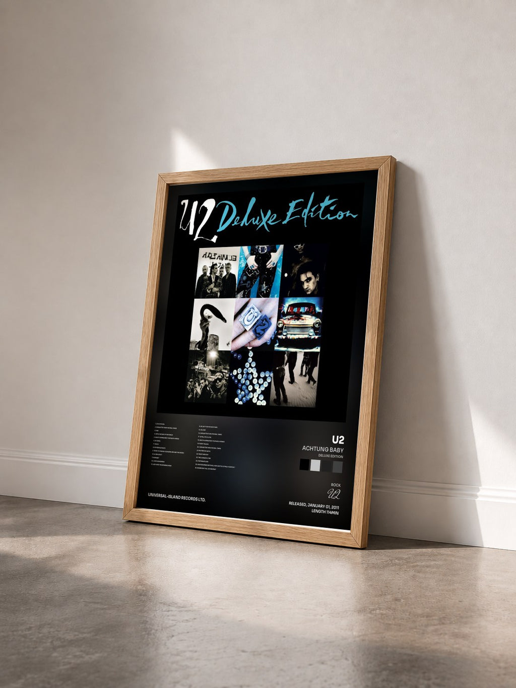 #bois Tableau de l'album Achtung Baby (Deluxe Edition) de U2 vu de trois quarts, cadre en bois brut