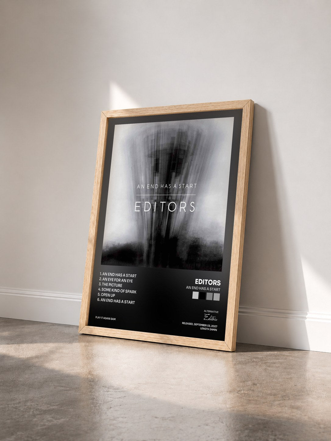 #bois Tableau de l'album An End Has A Start de Editors vu de trois quarts, cadre en bois brut