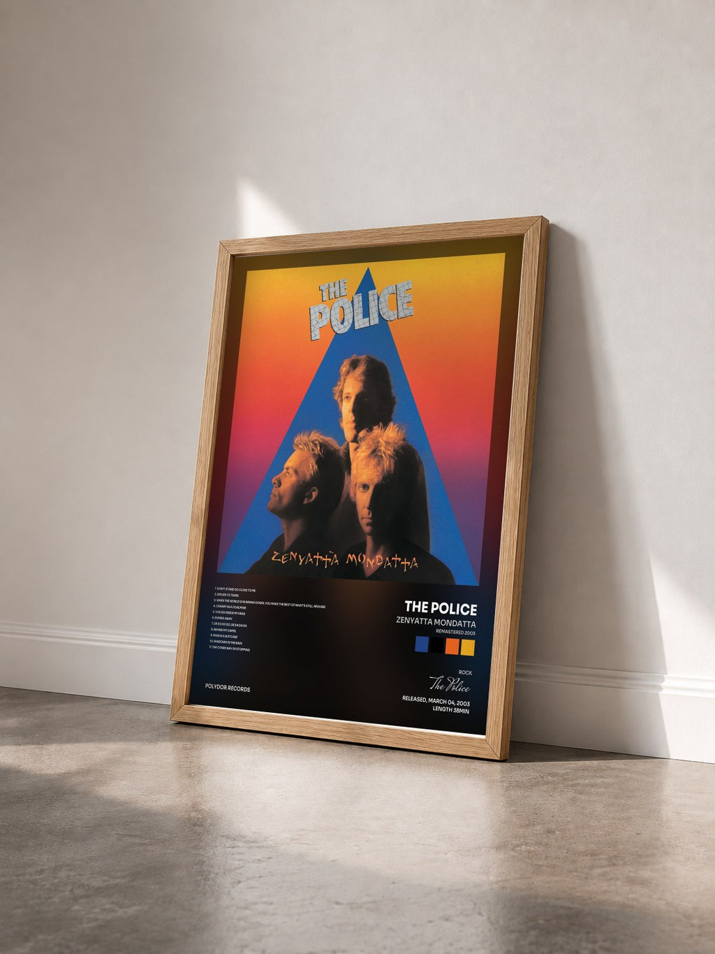 #bois Tableau de l'album Zenyatta Mondatta (Remastered 2003) de The Police vu de trois quarts, cadre en bois brut