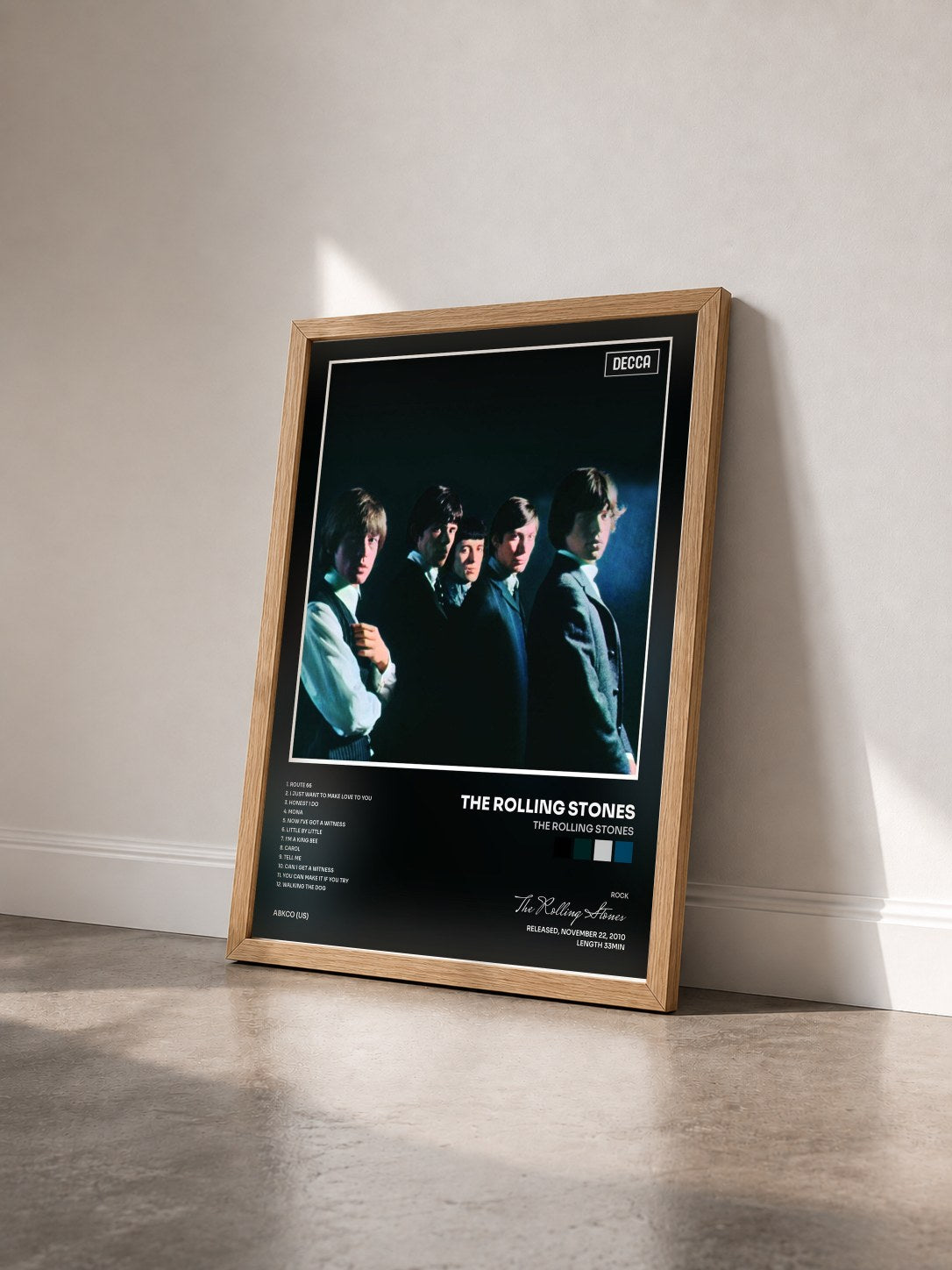#bois Tableau de l'album The Rolling Stones de The Rolling Stones vu de trois quarts, cadre en bois brut