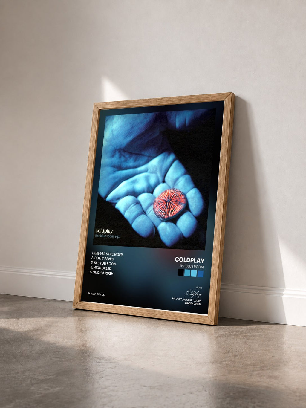 #bois Tableau de l'album The Blue Room de Coldplay vu de trois quarts, cadre en bois brut