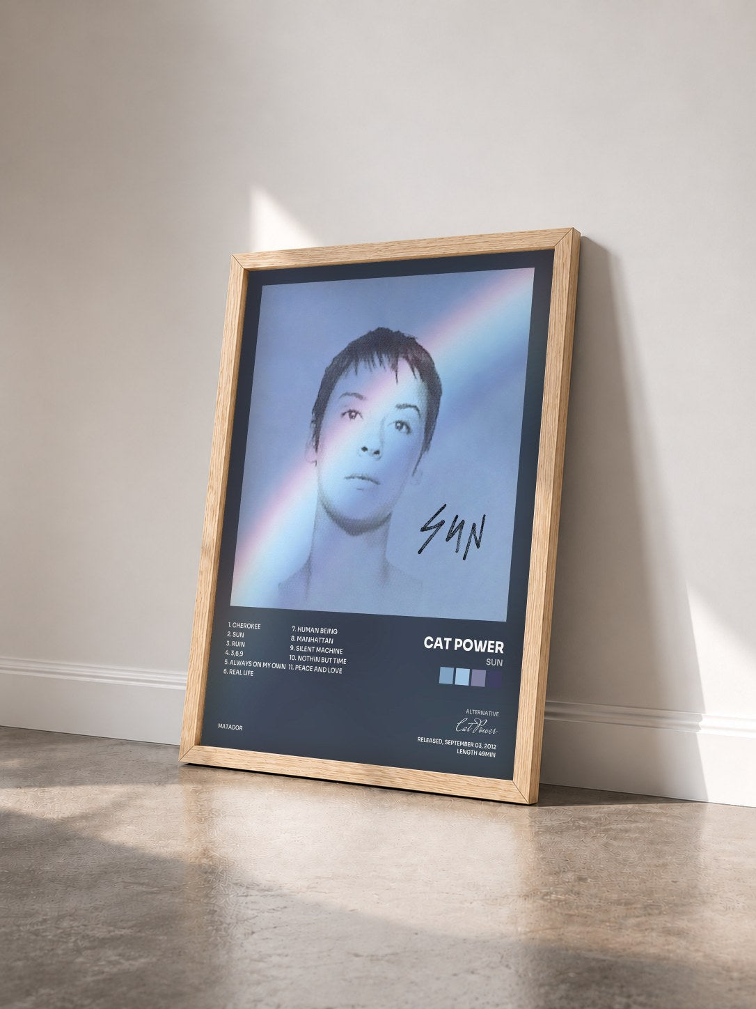 #bois Tableau de l'album Sun de Cat Power vu de trois quarts, cadre en bois brut