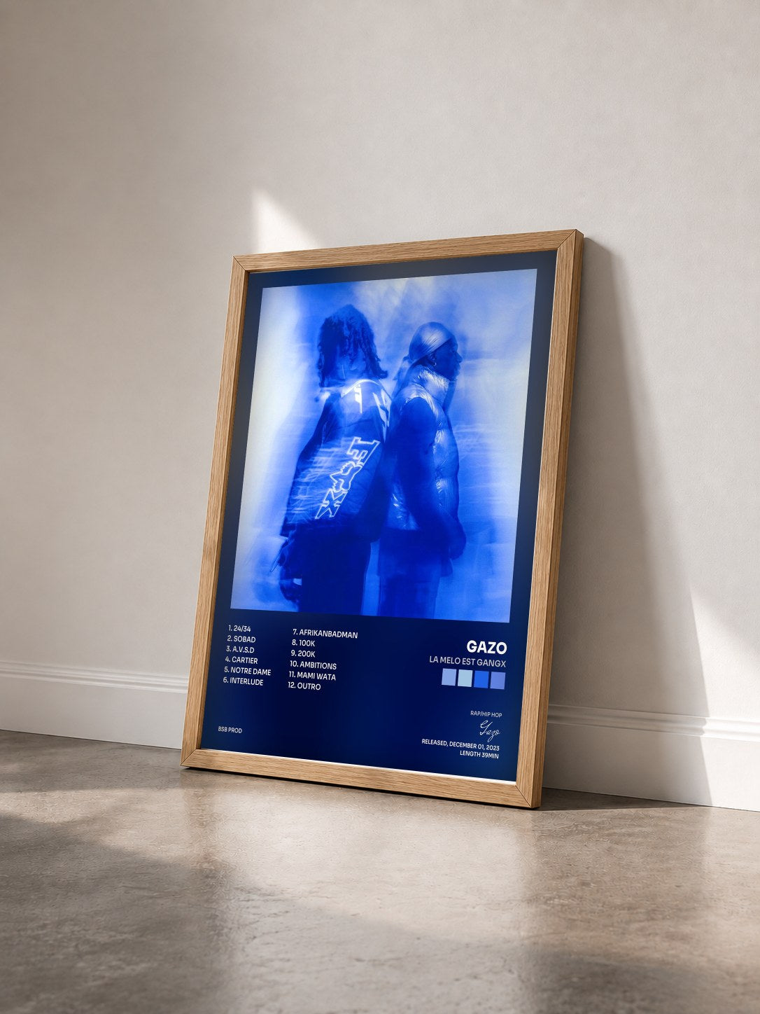 #bois Tableau de l'album LA MELO EST GANGX de Gazo vu de trois quarts, cadre en bois brut
