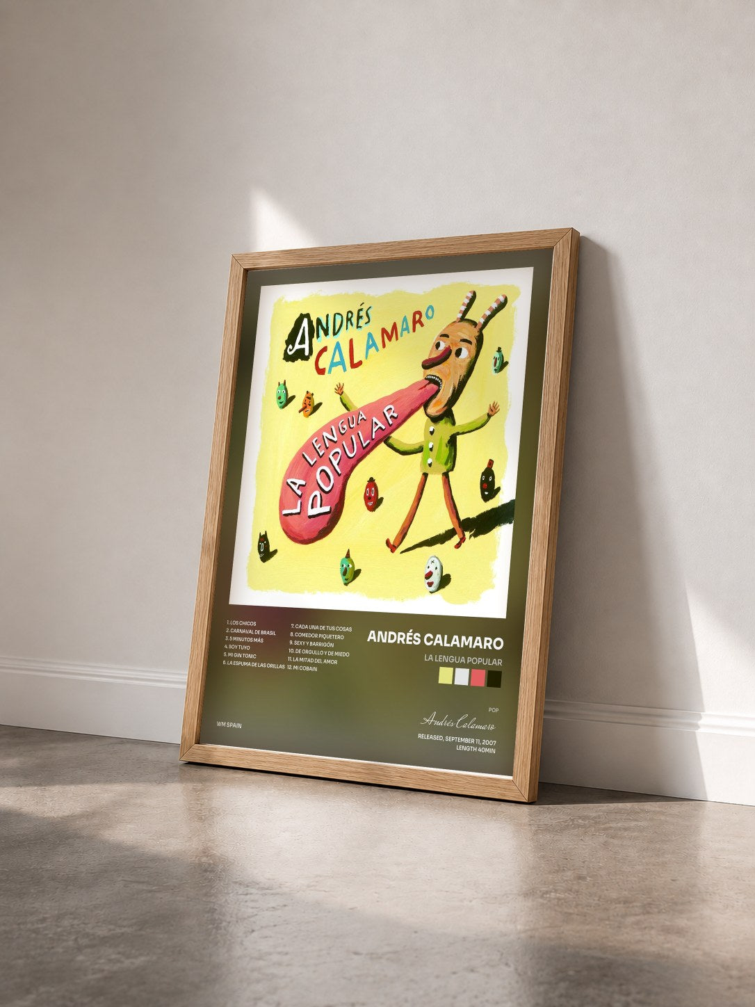 #bois Tableau de l'album La lengua popular de Andrés Calamaro vu de trois quarts, cadre en bois brut