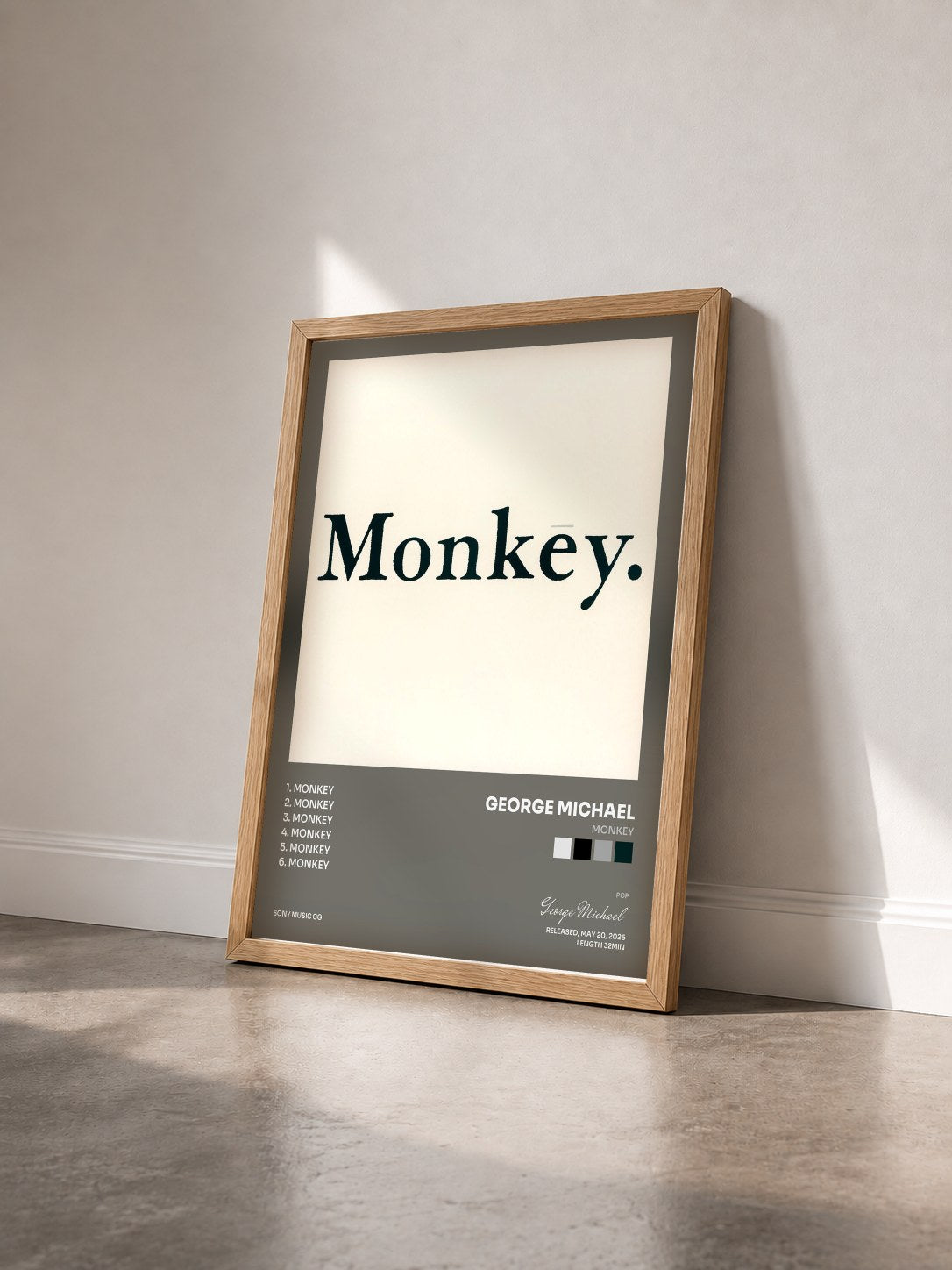 #bois Tableau de l'album Monkey de George Michael vu de trois quarts, cadre en bois brut
