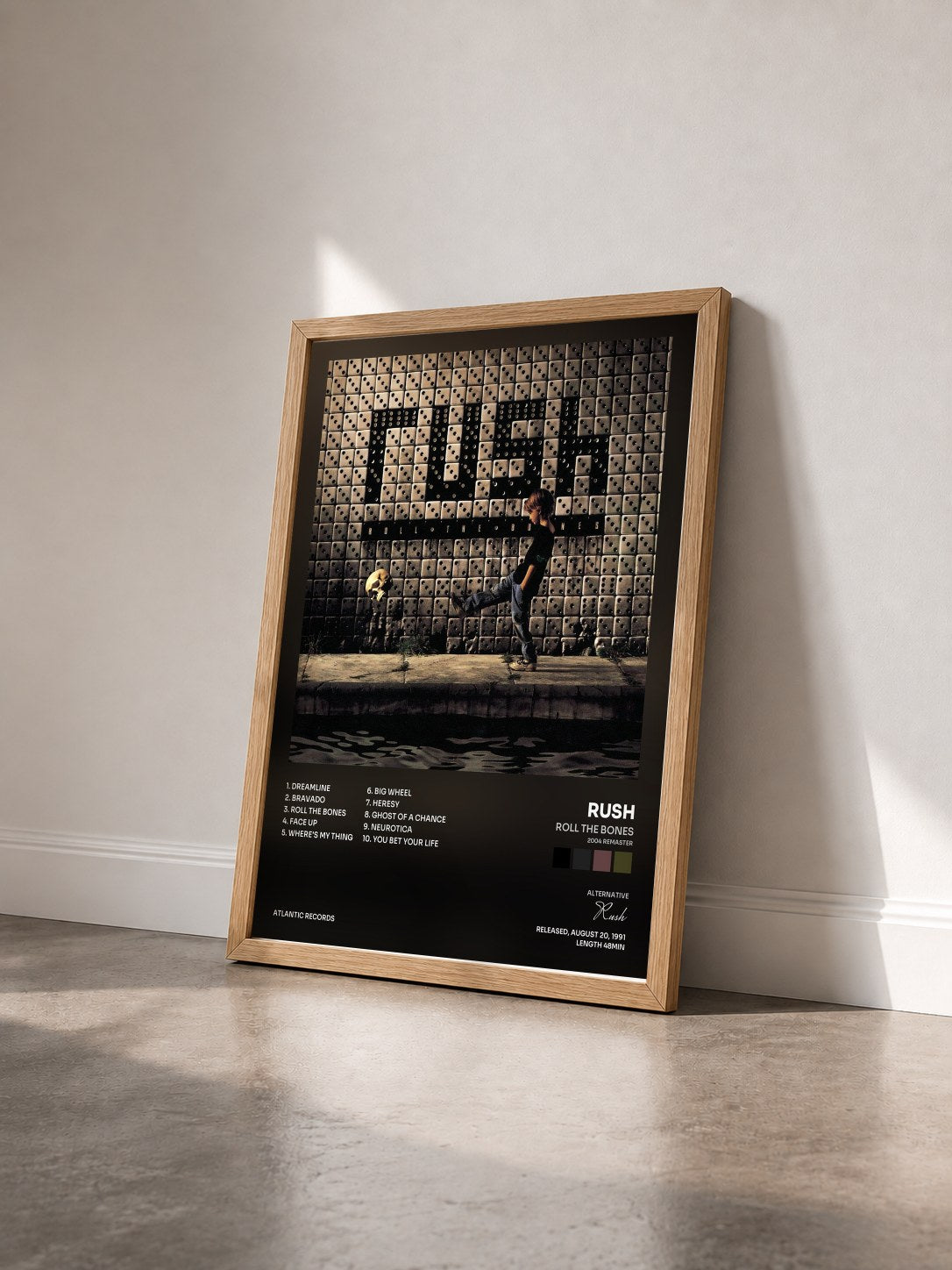 #bois Tableau de l'album Roll the Bones (2004 Remaster) de Rush vu de trois quarts, cadre en bois brut