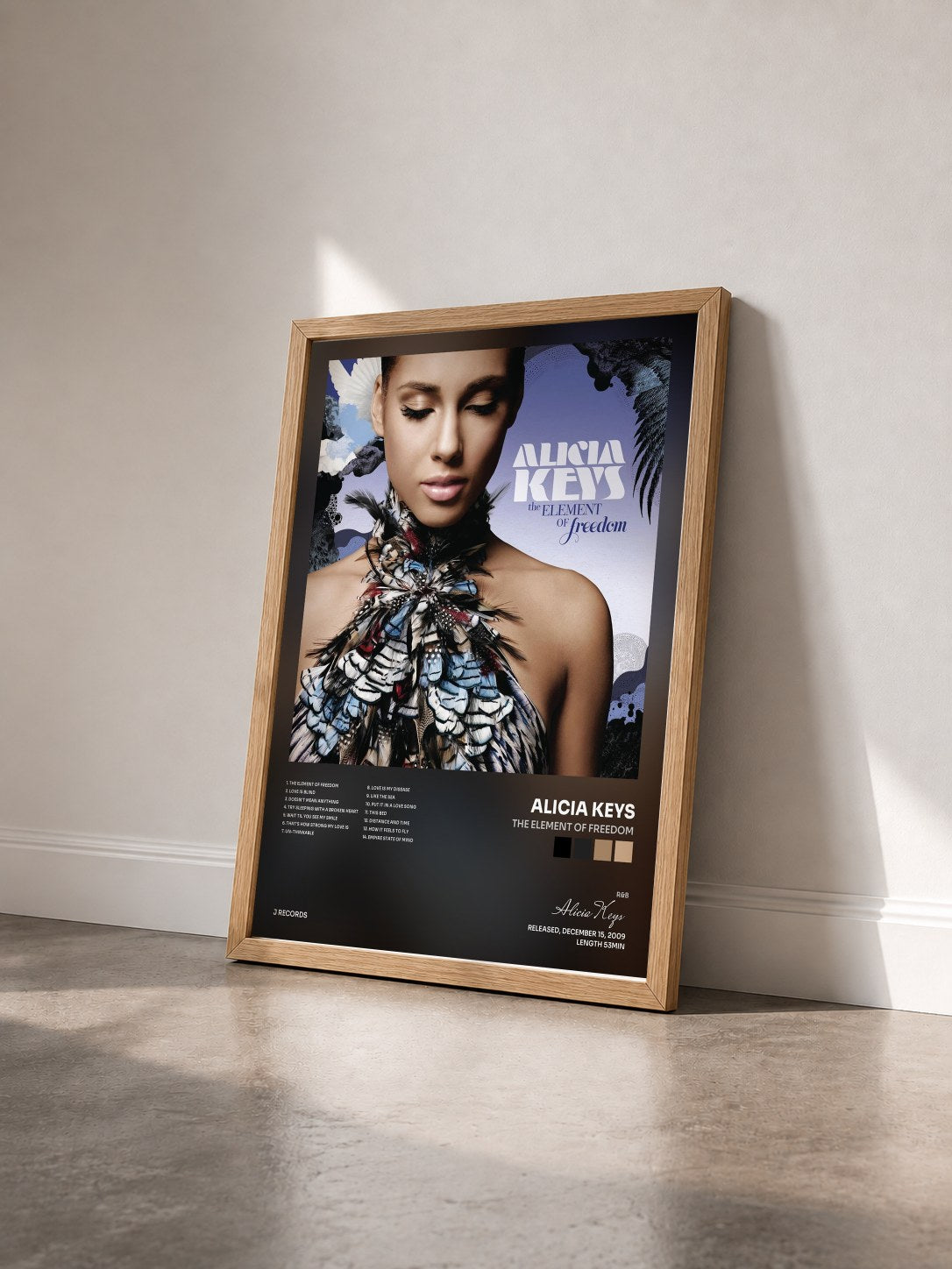 #bois Tableau de l'album The Element Of Freedom de Alicia Keys vu de trois quarts, cadre en bois brut