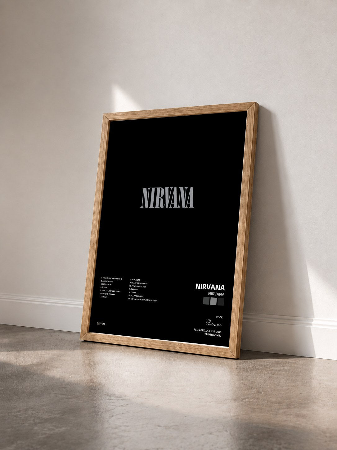 #bois Tableau de l'album Nirvana de Nirvana vu de trois quarts, cadre en bois brut