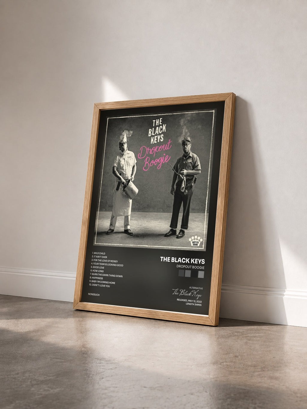 #bois Tableau de l'album Dropout Boogie de The Black Keys vu de trois quarts, cadre en bois brut