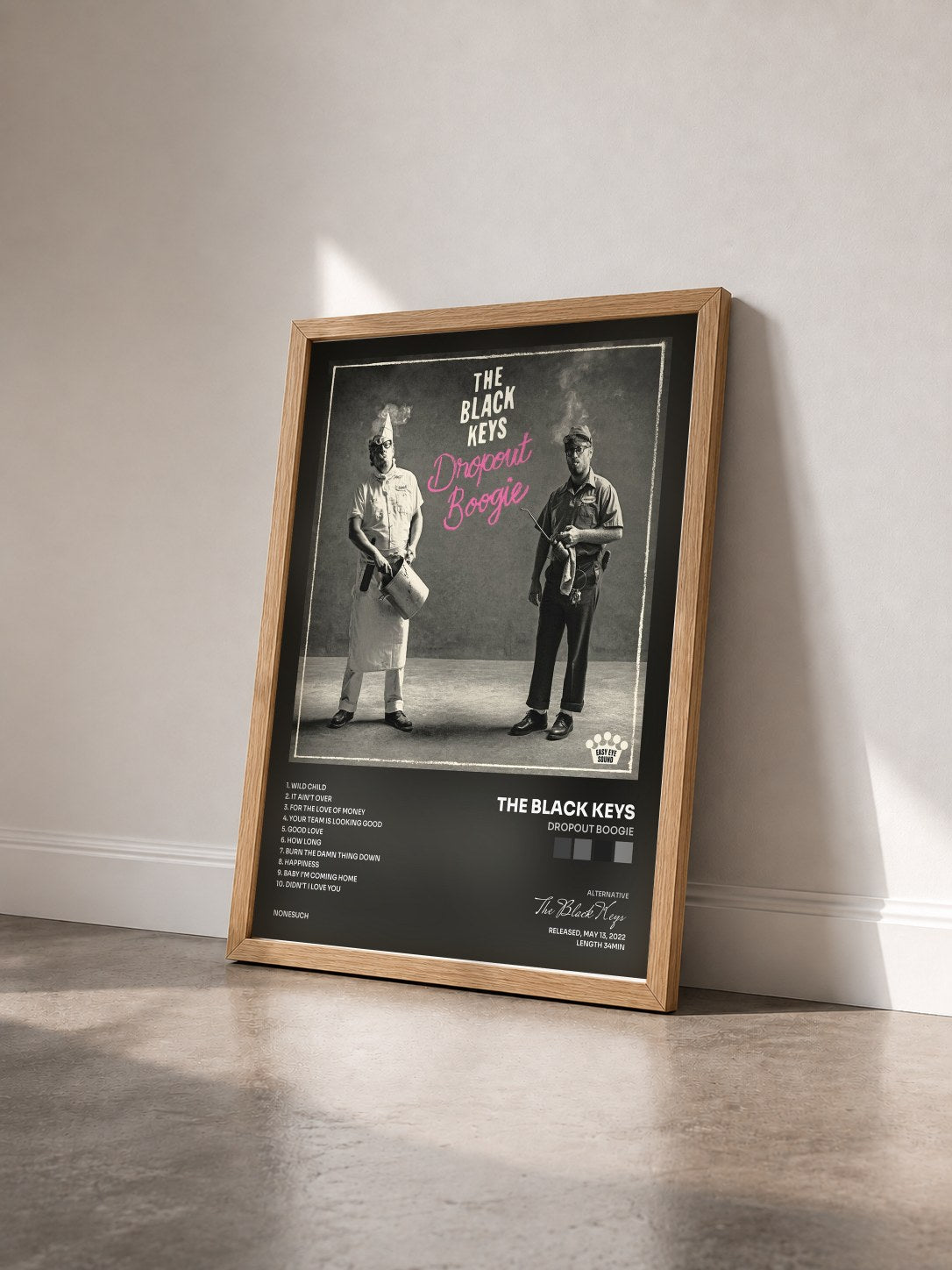 #bois Tableau de l'album Dropout Boogie de The Black Keys vu de trois quarts, cadre en bois brut