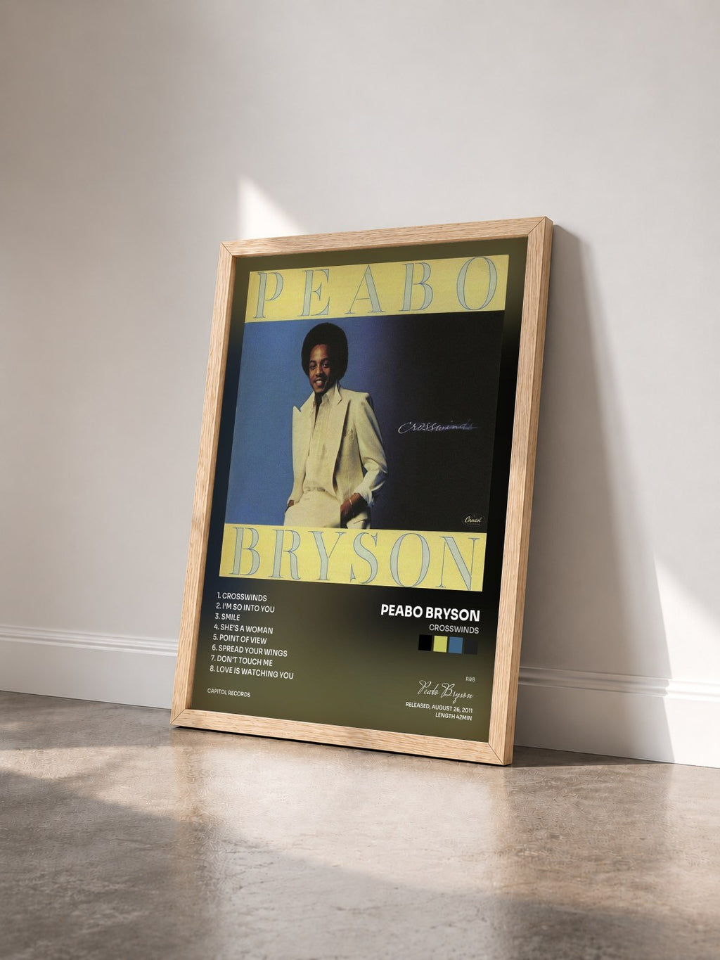 #bois Tableau de l'album Crosswinds de Peabo Bryson vu de trois quarts, cadre en bois brut