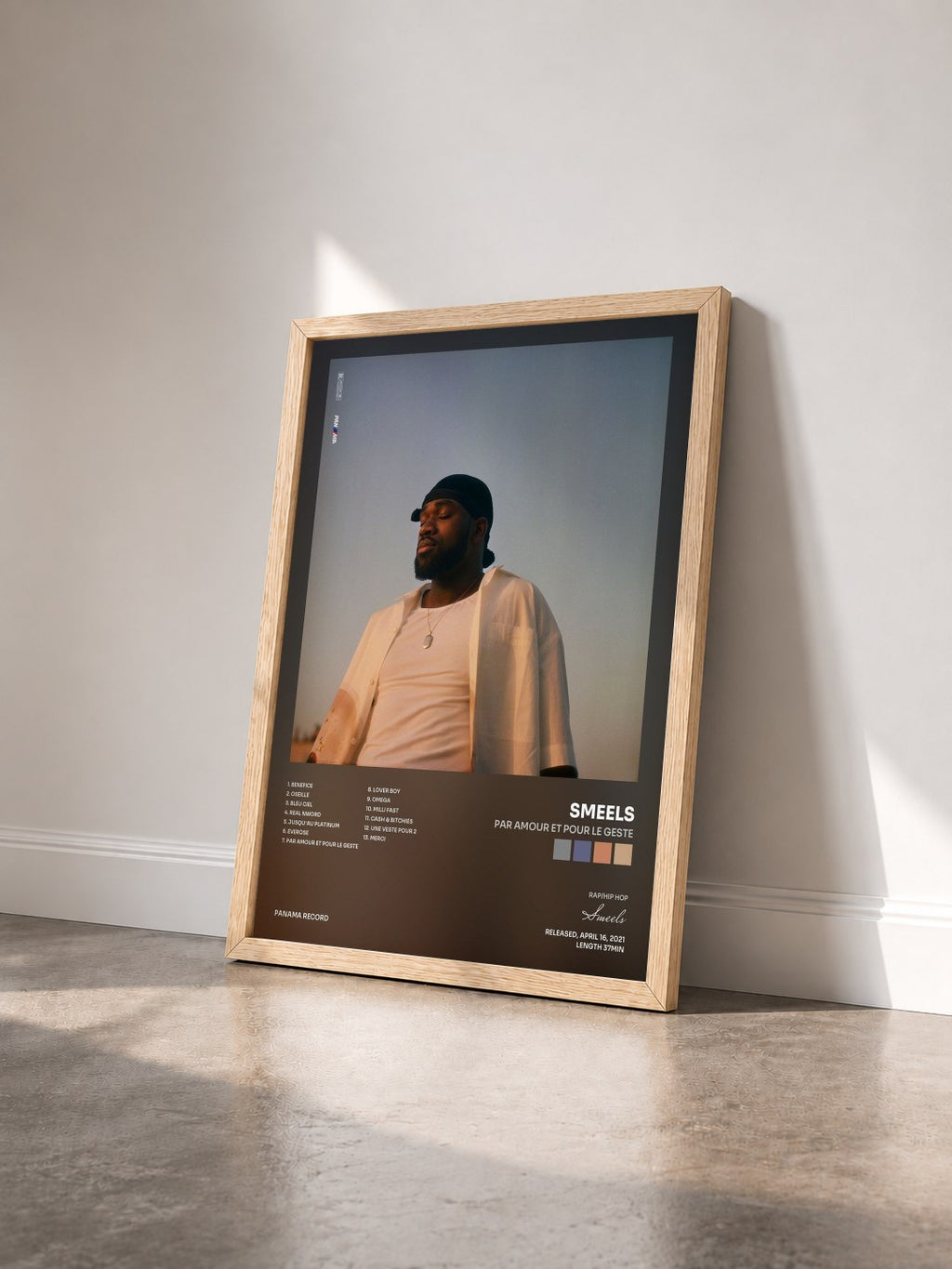 #bois Tableau de l'album Par amour et pour le geste de Smeels vu de trois quarts, cadre en bois brut