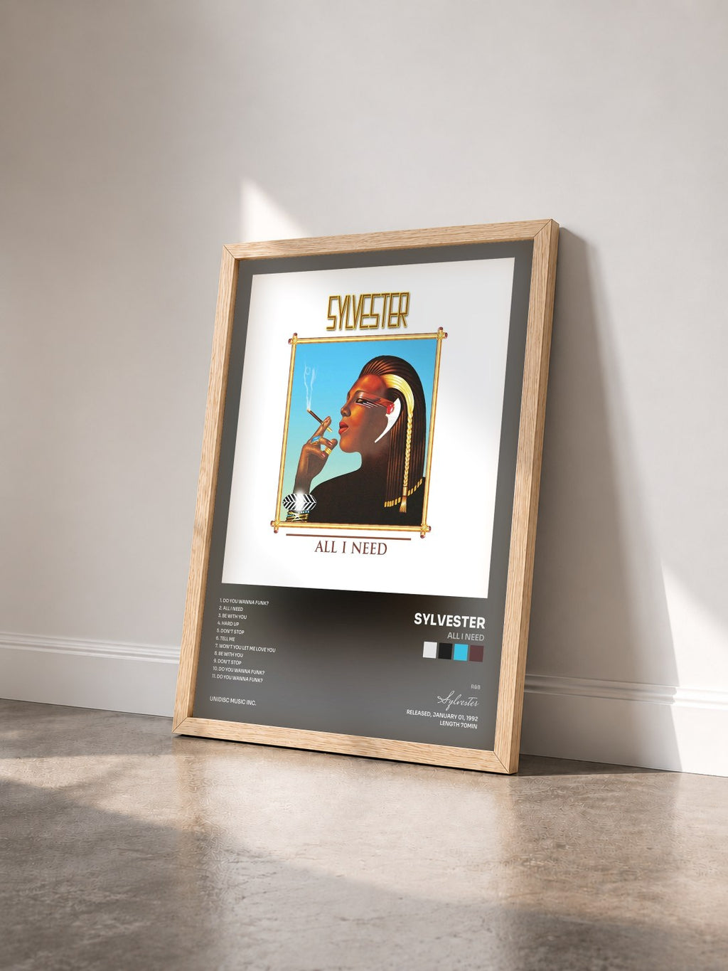 #bois Tableau de l'album All I Need de Sylvester vu de trois quarts, cadre en bois brut