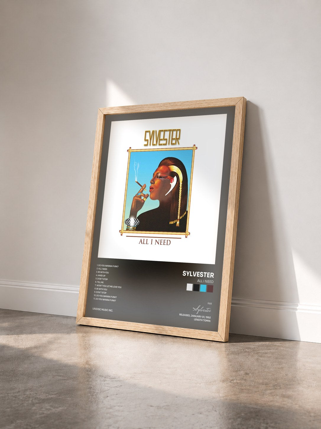 #bois Tableau de l'album All I Need de Sylvester vu de trois quarts, cadre en bois brut