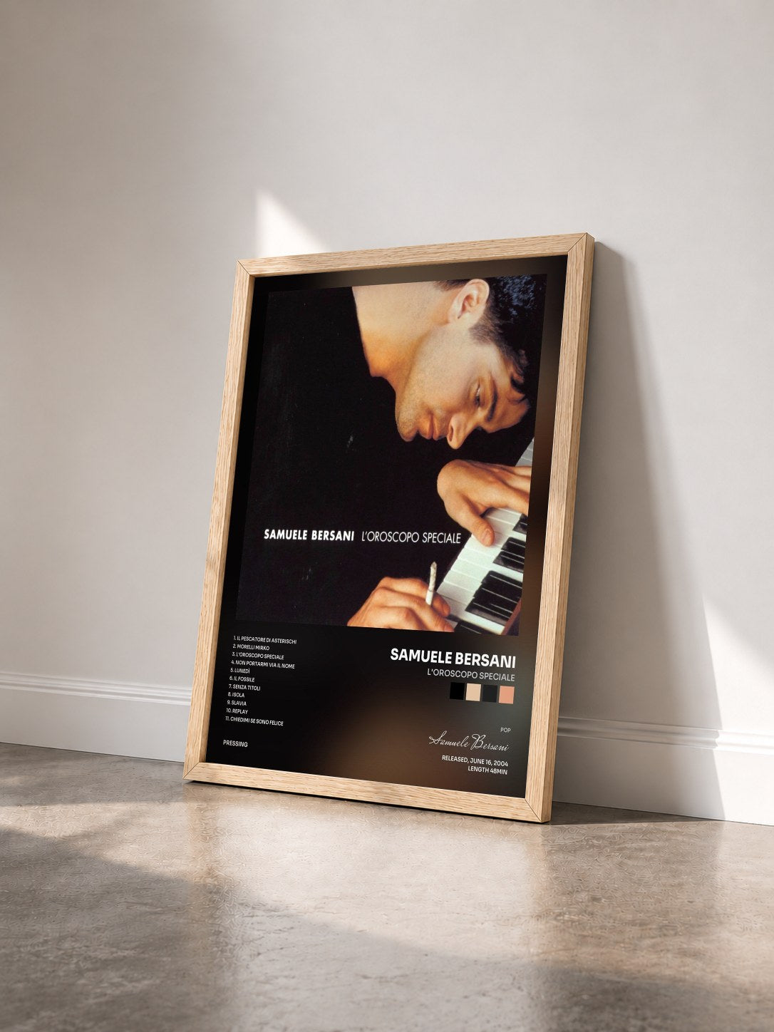 #bois Tableau de l'album l'Oroscopo Speciale de Samuele Bersani vu de trois quarts, cadre en bois brut