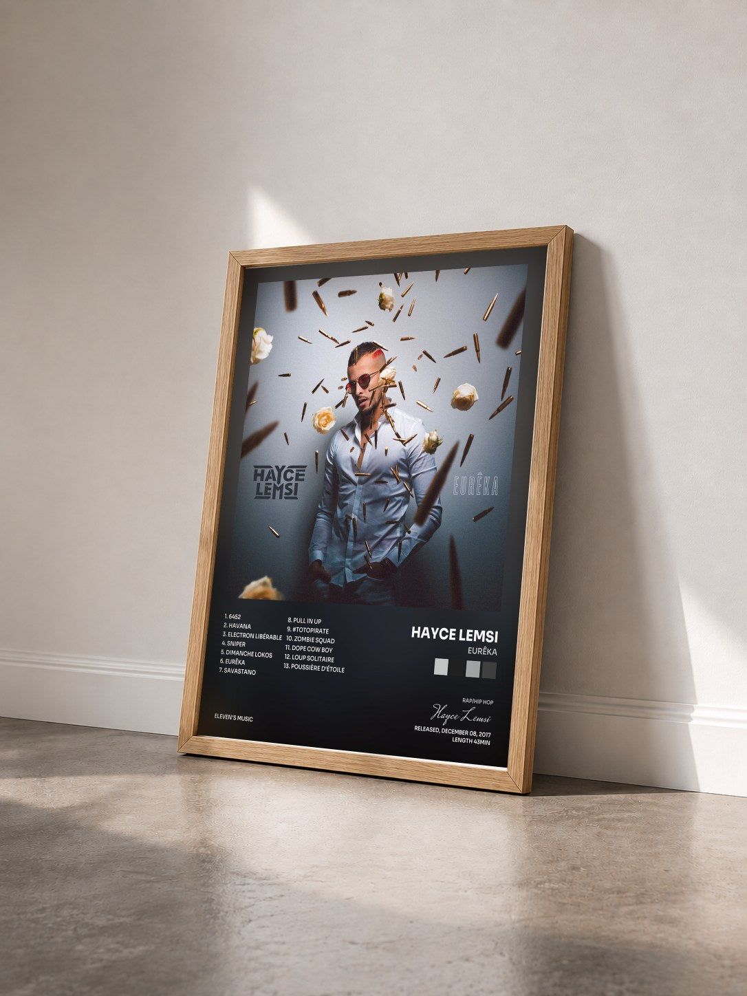 #bois Tableau de l'album Eurêka de Hayce Lemsi vu de trois quarts, cadre en bois brut