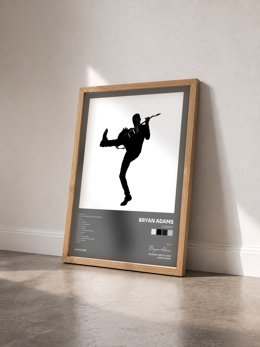 #bois Tableau de l'album Classic de Bryan Adams vu de trois quarts, cadre en bois brut